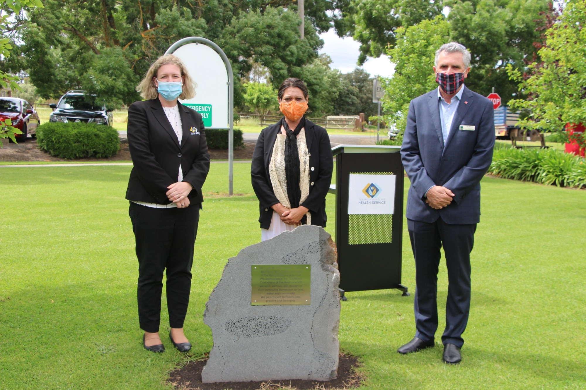 Always will be: Terang & Mortlake Health Services chief executive officer Julia Ogdin (from left), Kirrae Whurrong community member Tanya McDonald and Moyne Shire chief executive officer Bill Millard unveil the Mortlake Acknowledgement of Country plaque.