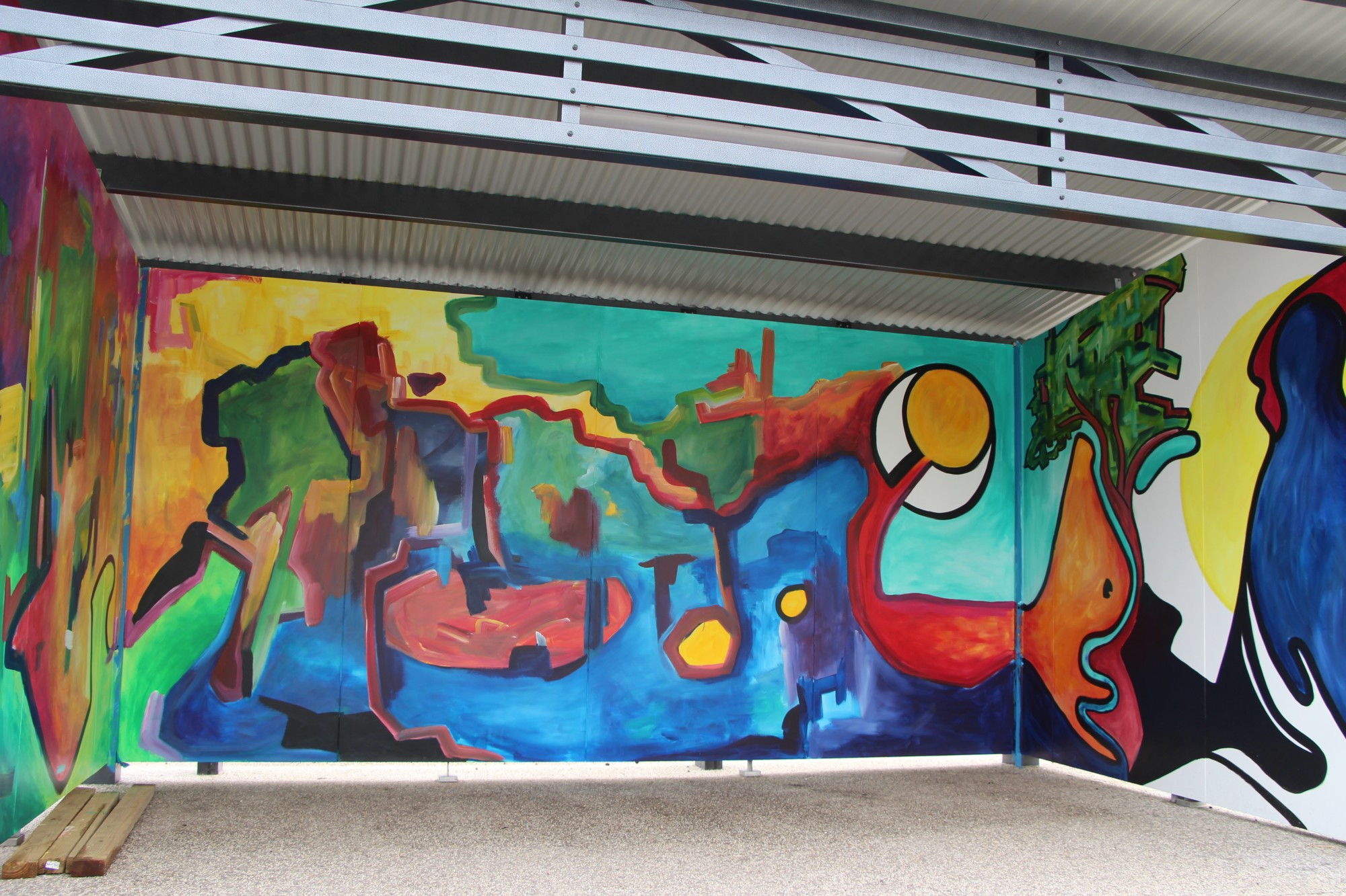 Positivity: Mortlake artist James Cody-Davis aims to bring colour and positive energy to Tea Tree Lake after beginning work on a new mural.