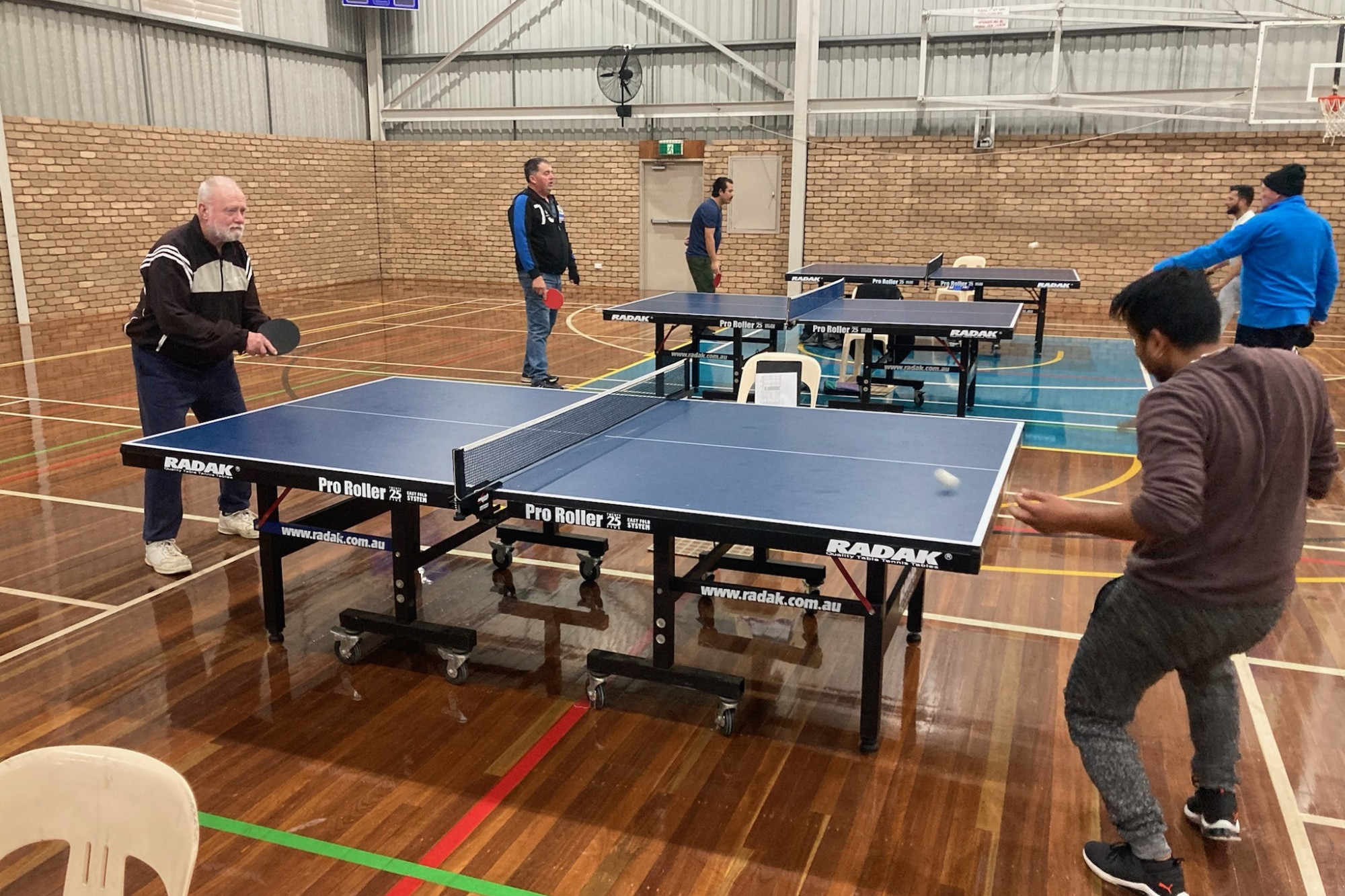 The Bloods’ Vesha Chapagain won his singles against Pat Nicholson in four games, but his team lost to Three and a Half Men.