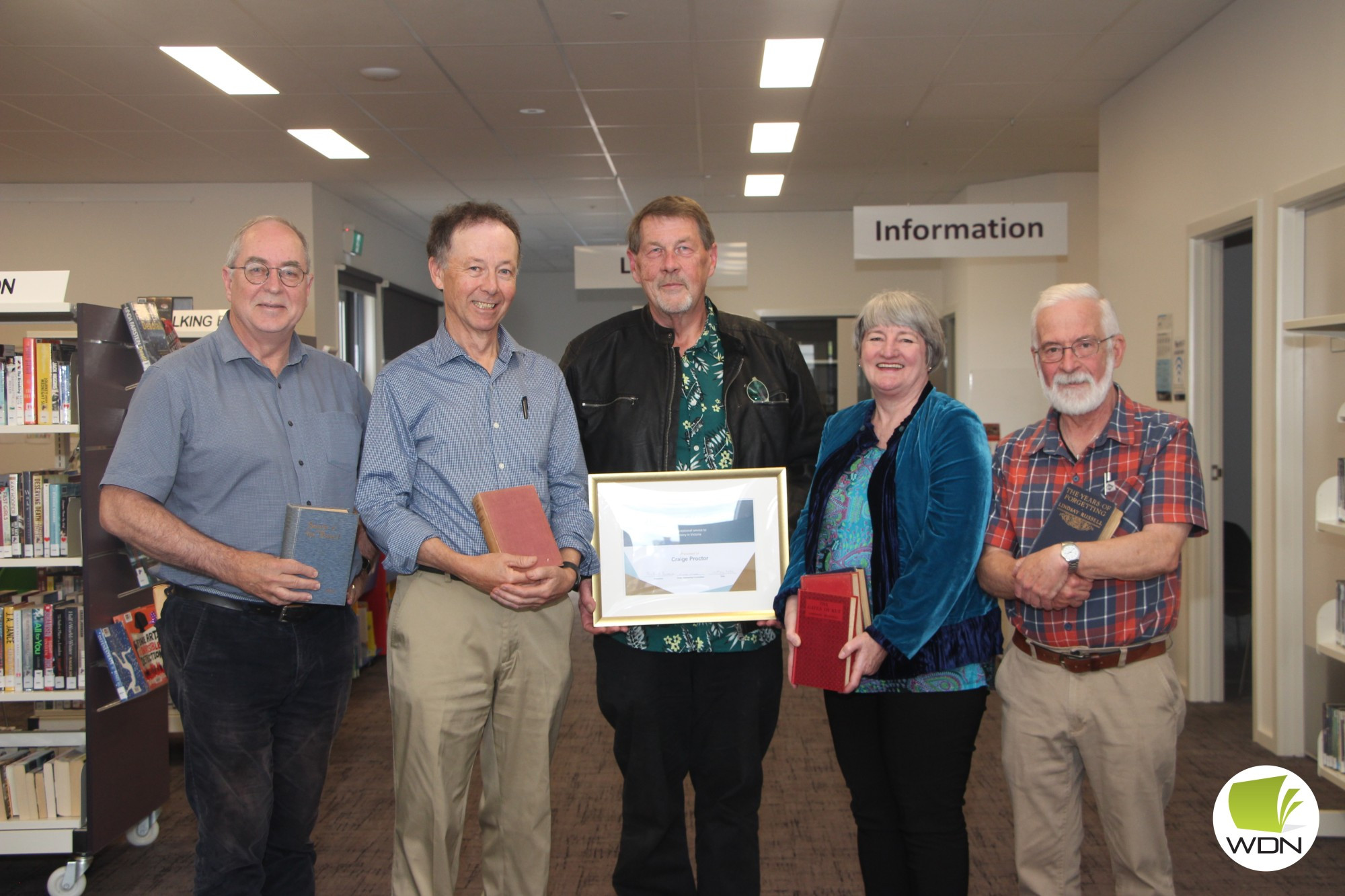 Historic: Dr Tim Lowe (from left), Royal Historical Society’s Dr Peter Yule, Mortlake and District Historical Society president Craige Proctor, Mortlake and District Historical Society secretary Jillian Clingan and Mortlake Community Development Committee president Kelvin Goodall shared a special moment in Mortlake’s history over the weekend.