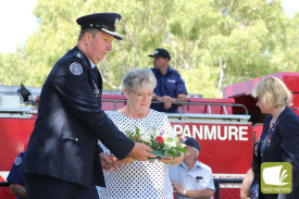 Country Fire Authority deputy chief officer Rohan Luke and board member Beth Davidson lay a wreath. 