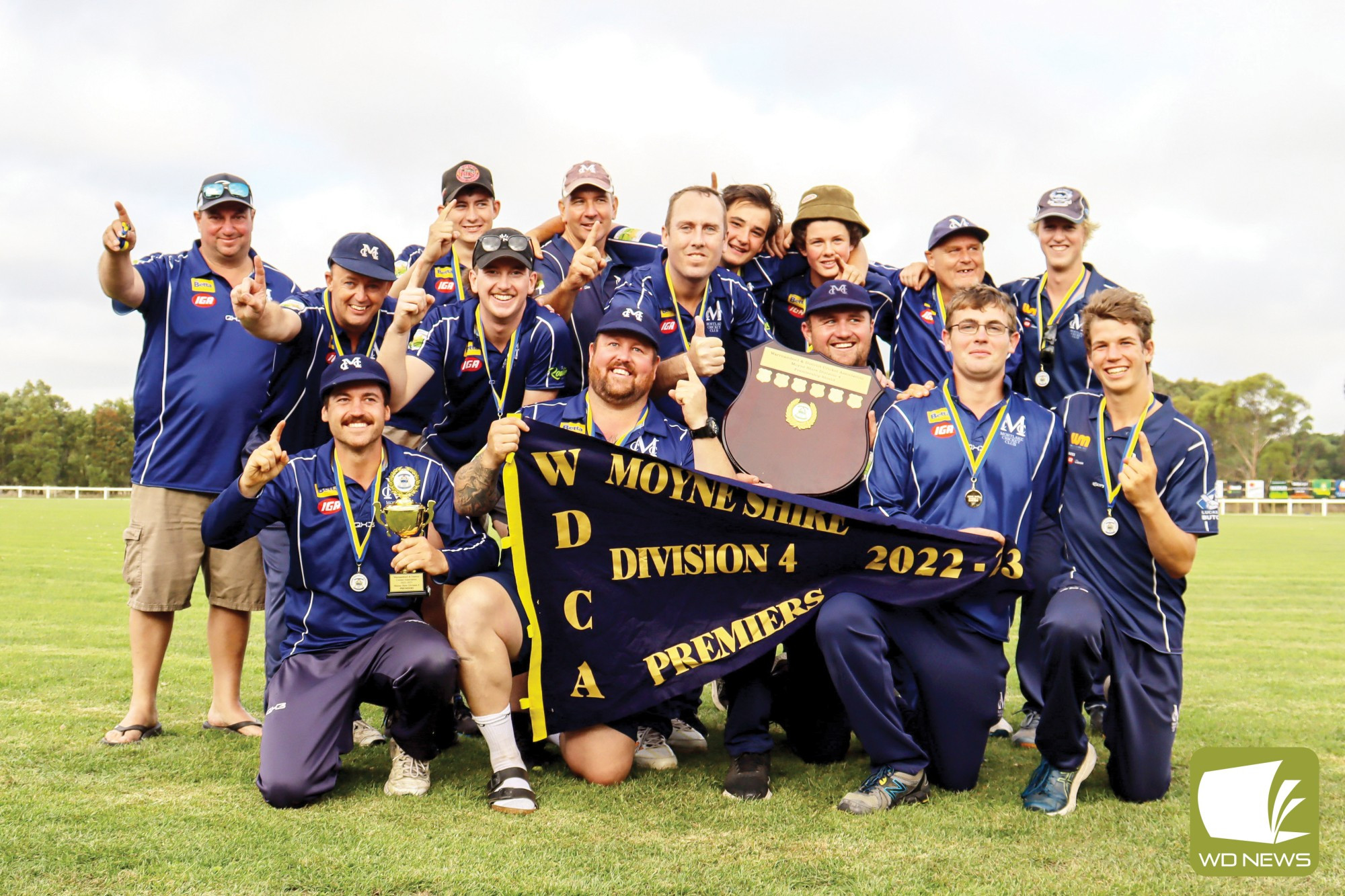 Number one: Mortlake’s division four side celebrates after winning last Saturday’s grand final.