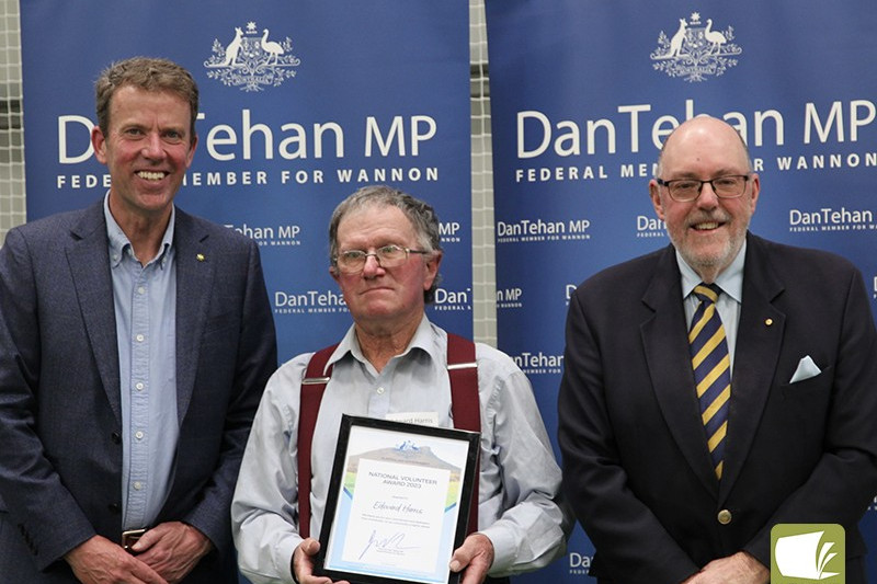 Well deserved: Mortlake’s Edward Harris was recognised with a national volunteer award for his dedication to the Mortlake Recreation Reserve last Friday. He was joined by Dan Tehan and Mick Murphy for the presentation.