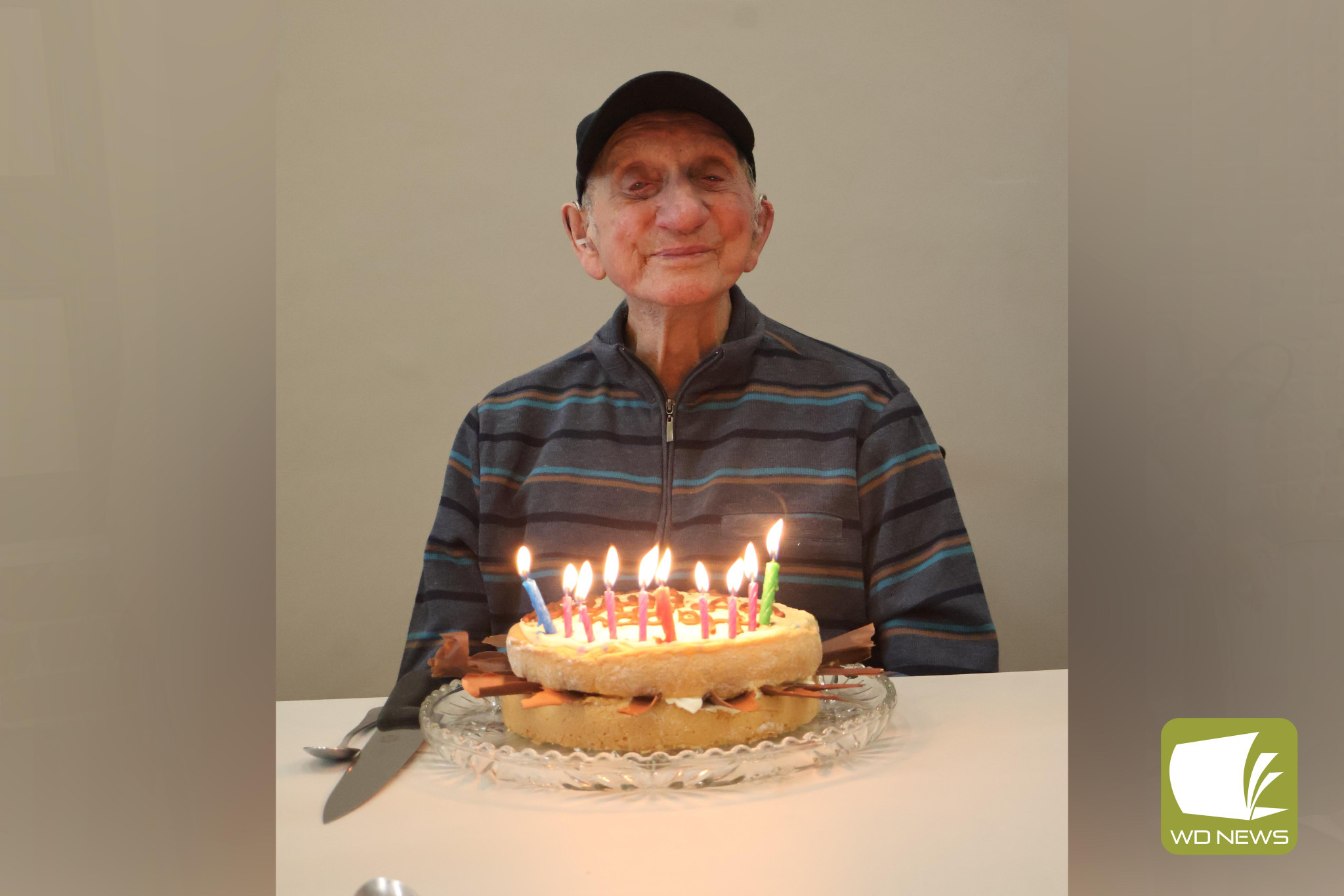 Marking a milestone: At the Uniting Church’s last community meal for term one, Albert Beasley was presented with a birthday cake to celebrate his century of life.