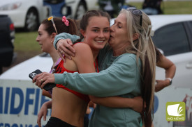 Celebration: Kylee Drew celebrated after gaining ground on the home straight to claim victory in the women’s 300 metre.