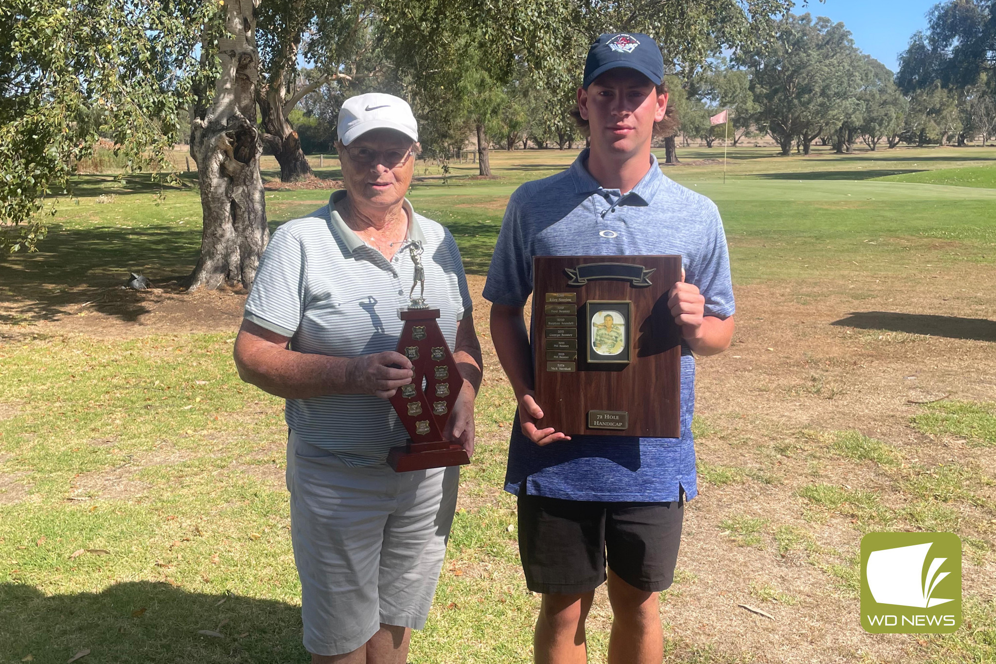 Judy Carmondy (Betty Day Ladies’ overall handicap champion) and Darcy Hutchins (John Petrusch men’s overall handicap champion).
