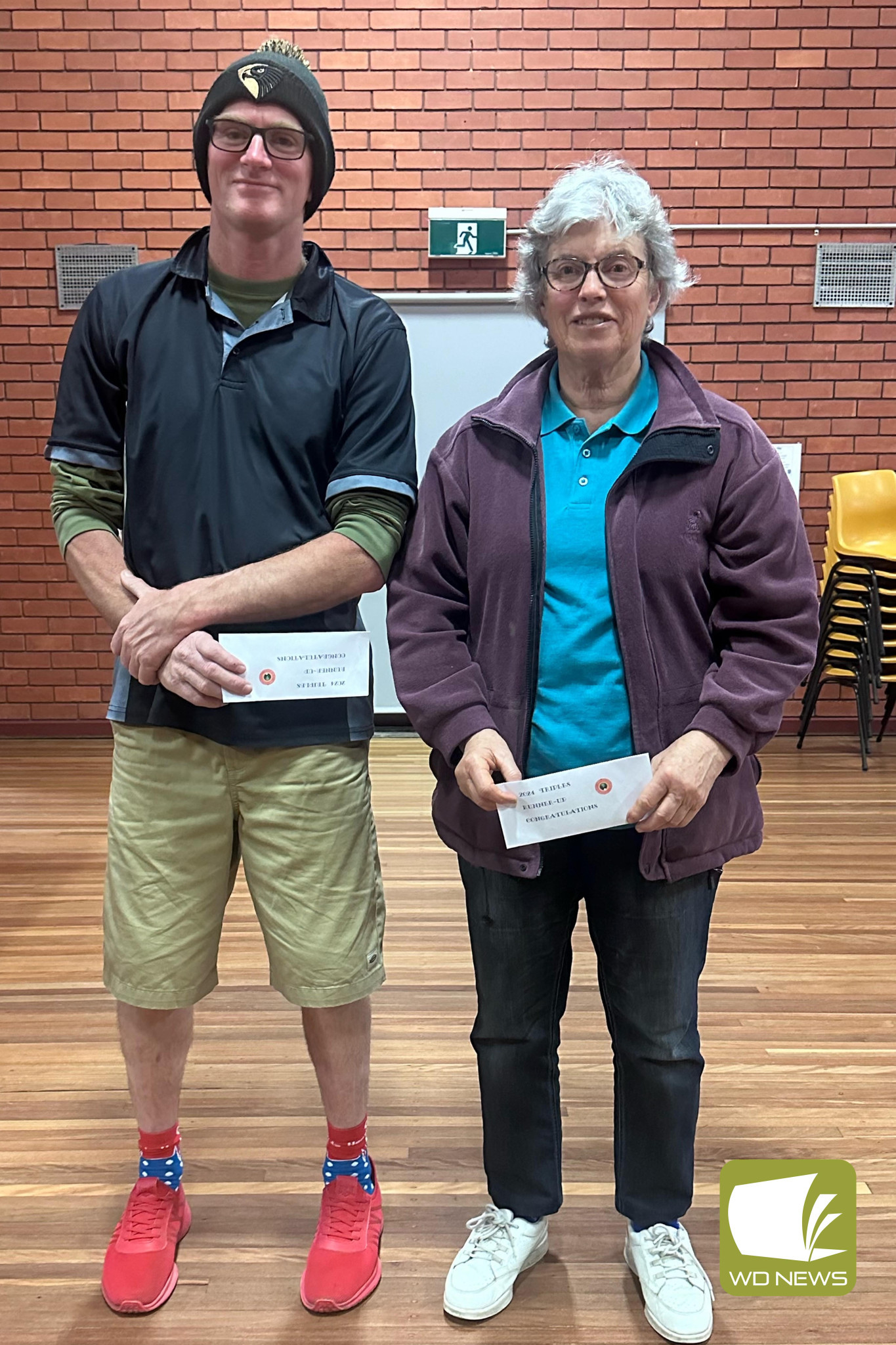 Tournament runners-up (from left) Jason Mungean and Dawn McDowell.