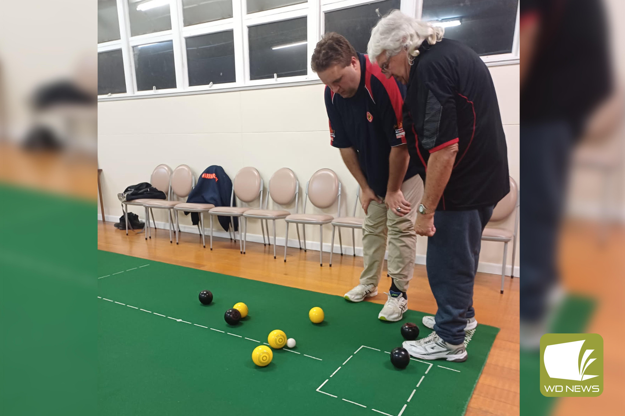 Cobden 2 Third David Childs (left) discusses with Skip Brad Wilson what shot to play next against Mepunga 2.
