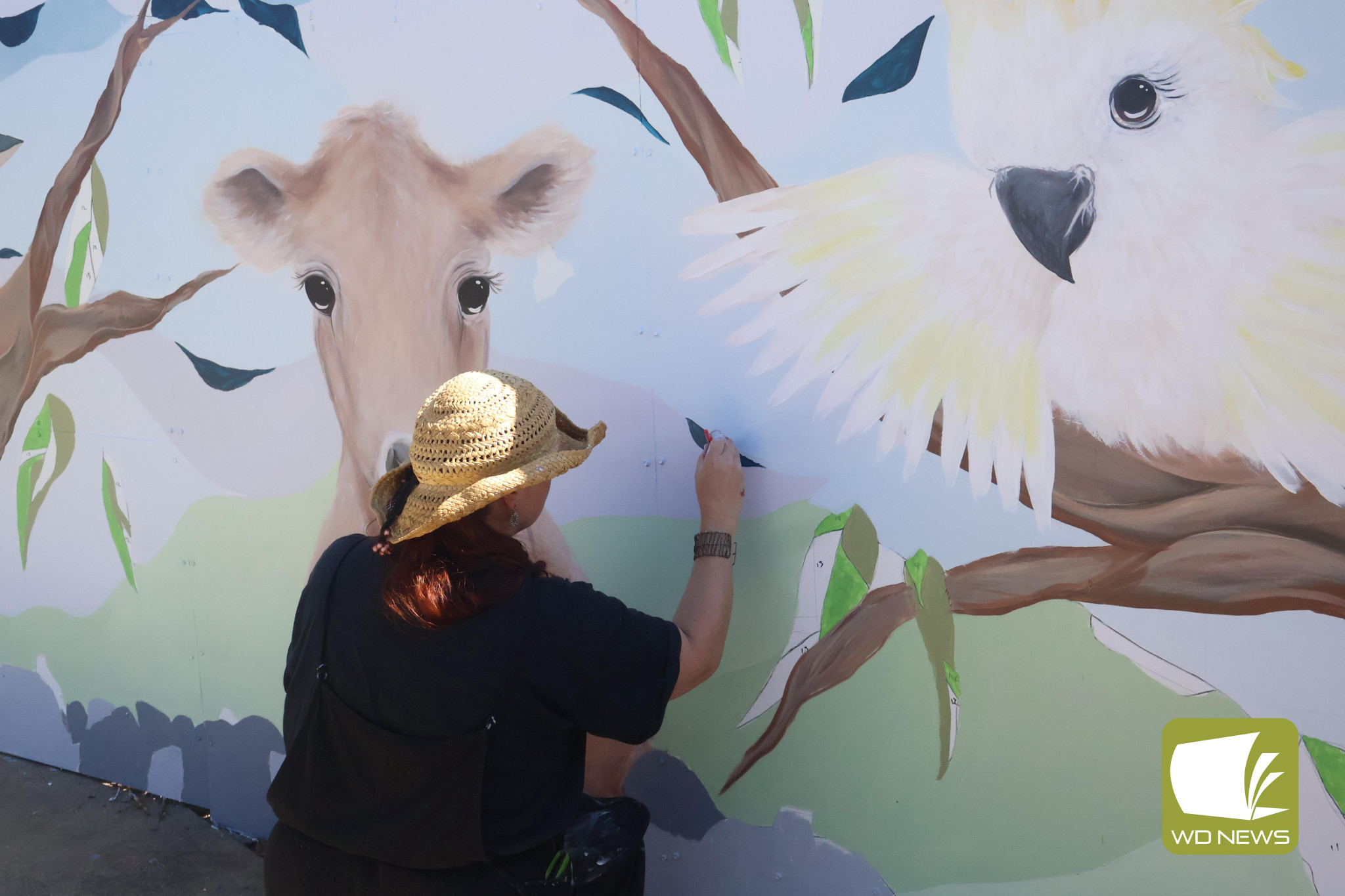 Capturing the area: Glenormiston artist Jess Fowler has been working on a mural for Merindah Lodge, featuring animals commonly seen around Camperdown and the surrounding area.