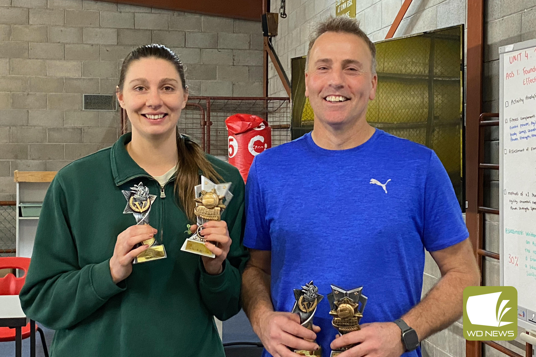 Best and fairest winners Sarah McMaster and John Tanner.