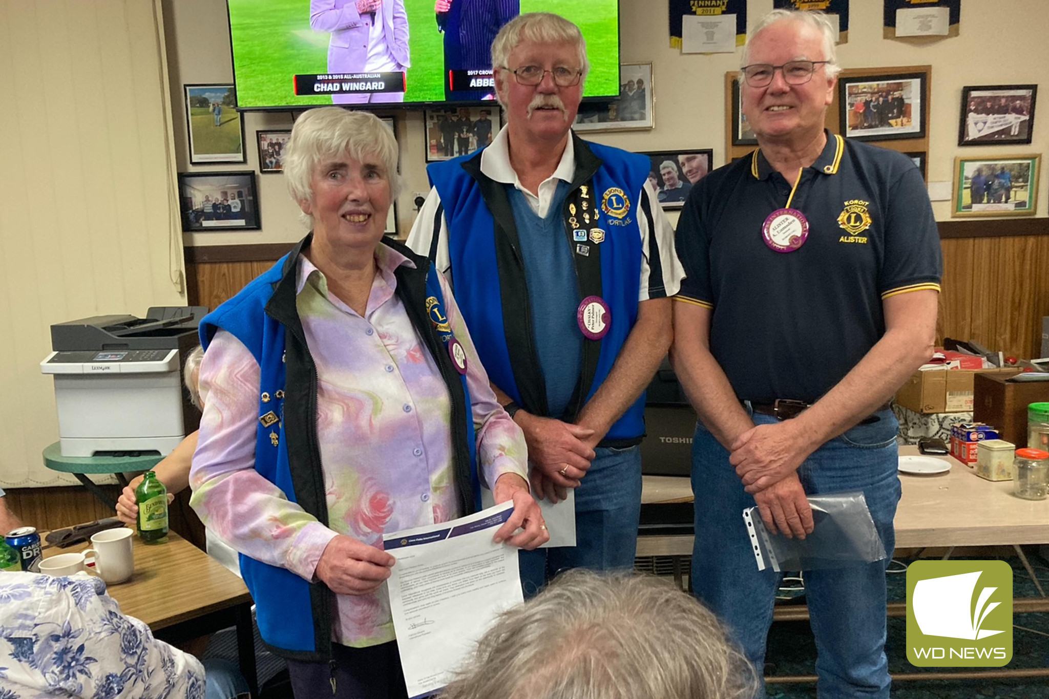 Recognition: The Mortlake Lions recently hosted a successful trivia night recently which saw two of its members recognised for a combined 55 years of dedication to the community. Pictured is Heather Rowe, Peter Palmer and Zone Chairman Alister Lumsden.
