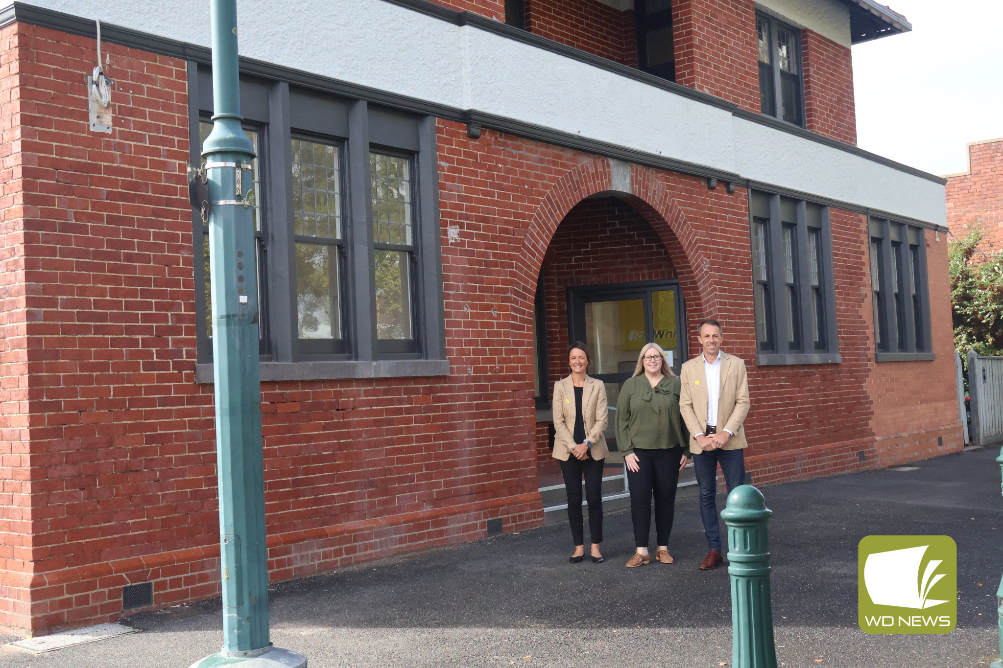 Proud of the heritage: Ray White directors Davinia Pickles, Chloe Winzar and Alistair Tune are thrilled with their new location, which has been restored to its former glory.