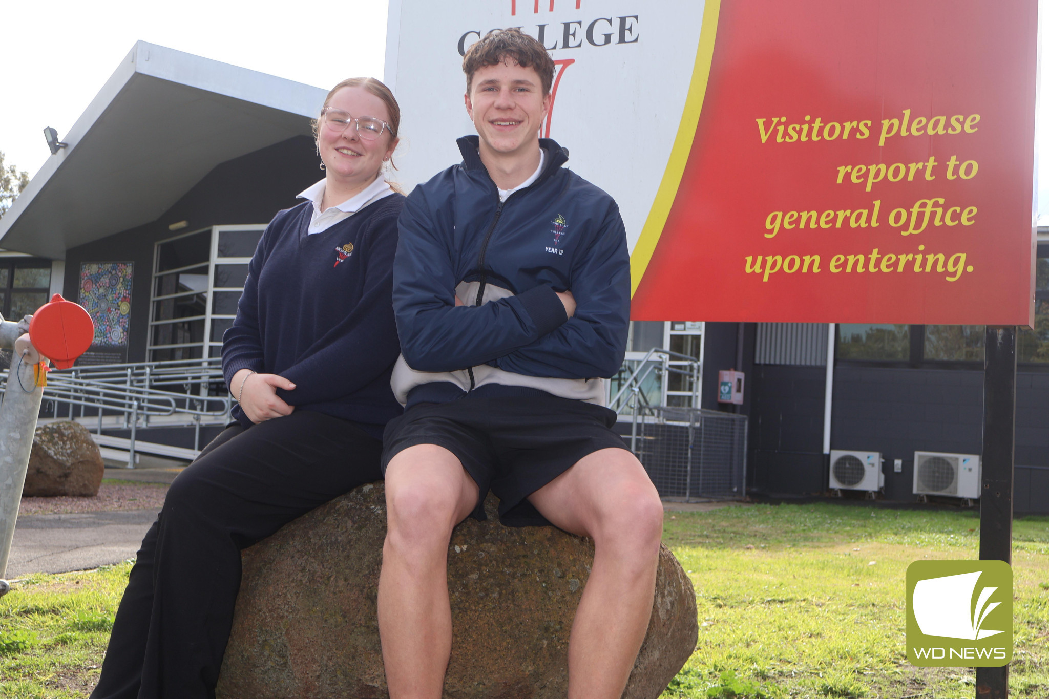 For a good cause: Mortlake College P-12 school captains Molly Goddard and Jack Fowler are among the senior students who smashed out 3214 push-ups throughout June as part of a challenge to raise awareness surrounding mental health.