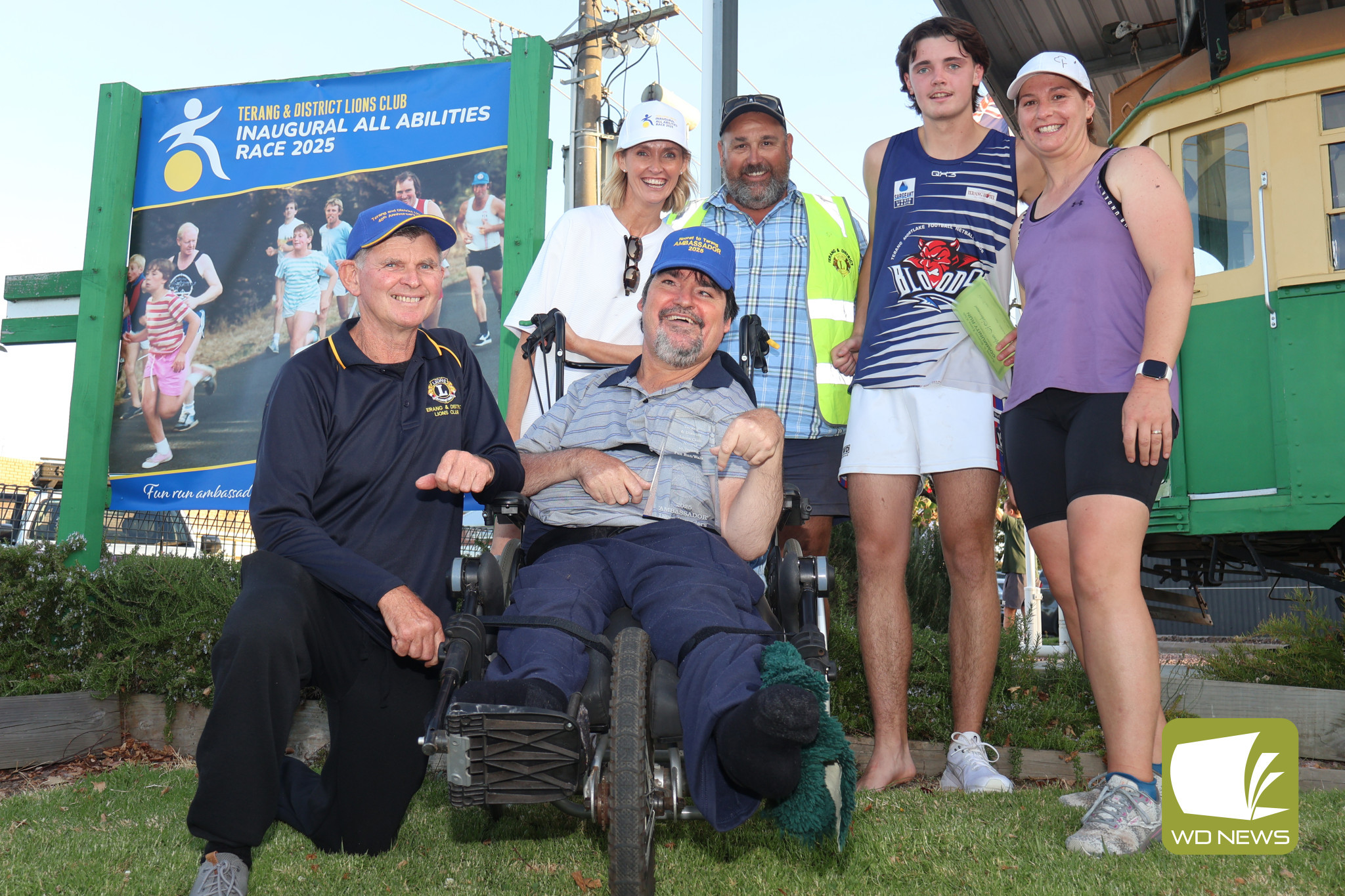 Milestone: Noorat to Terang Fun Run and Walk 2025 event ambassador Dean Saunders was presented with a trophy and cap by members of the Terang and District Lions Club and Corangamite Shire mayor Kate Makin.