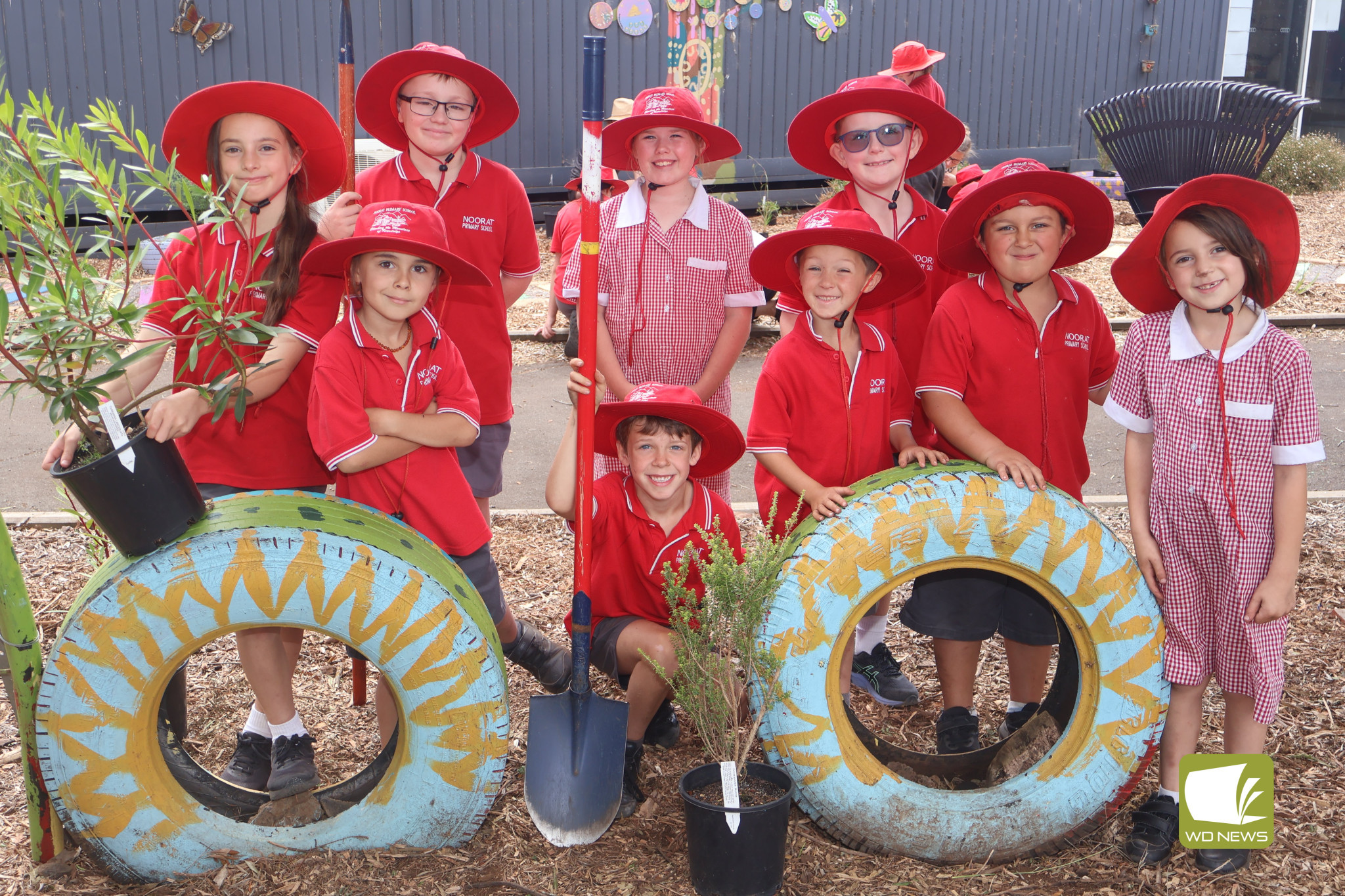 Growing together: Noorat Primary School students learned more about native bush tucker as they set about planting a new sensory garden at the school, with the help of Worn Gundidj Nursery.