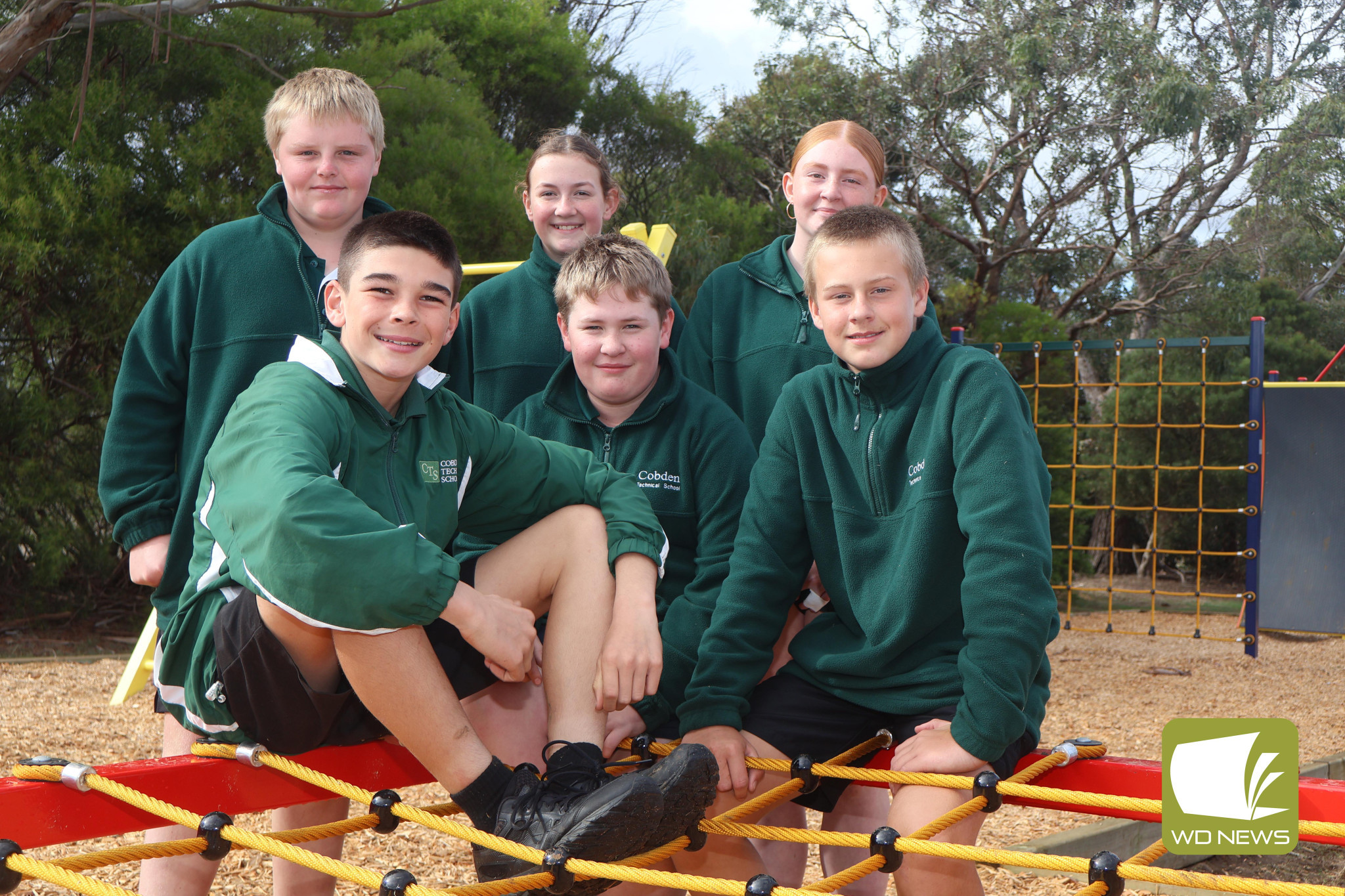 Inner ninja: Cobden Technical School students are all smiles thanks to the new addition of a ‘Ninja Warrior’ style obstacle course, which has been built as part of State Government funding.