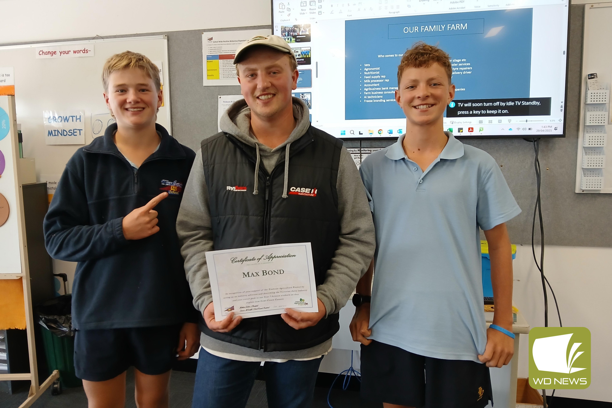 Career opportunity: Jeddah Loughnan (left) and Jed Watson (right) were excited for the opportunity to speak with dairy farmer Max Bond (middle) about career pathways in the dairy industry, presenting him with a certificate of appreciation from the school.
