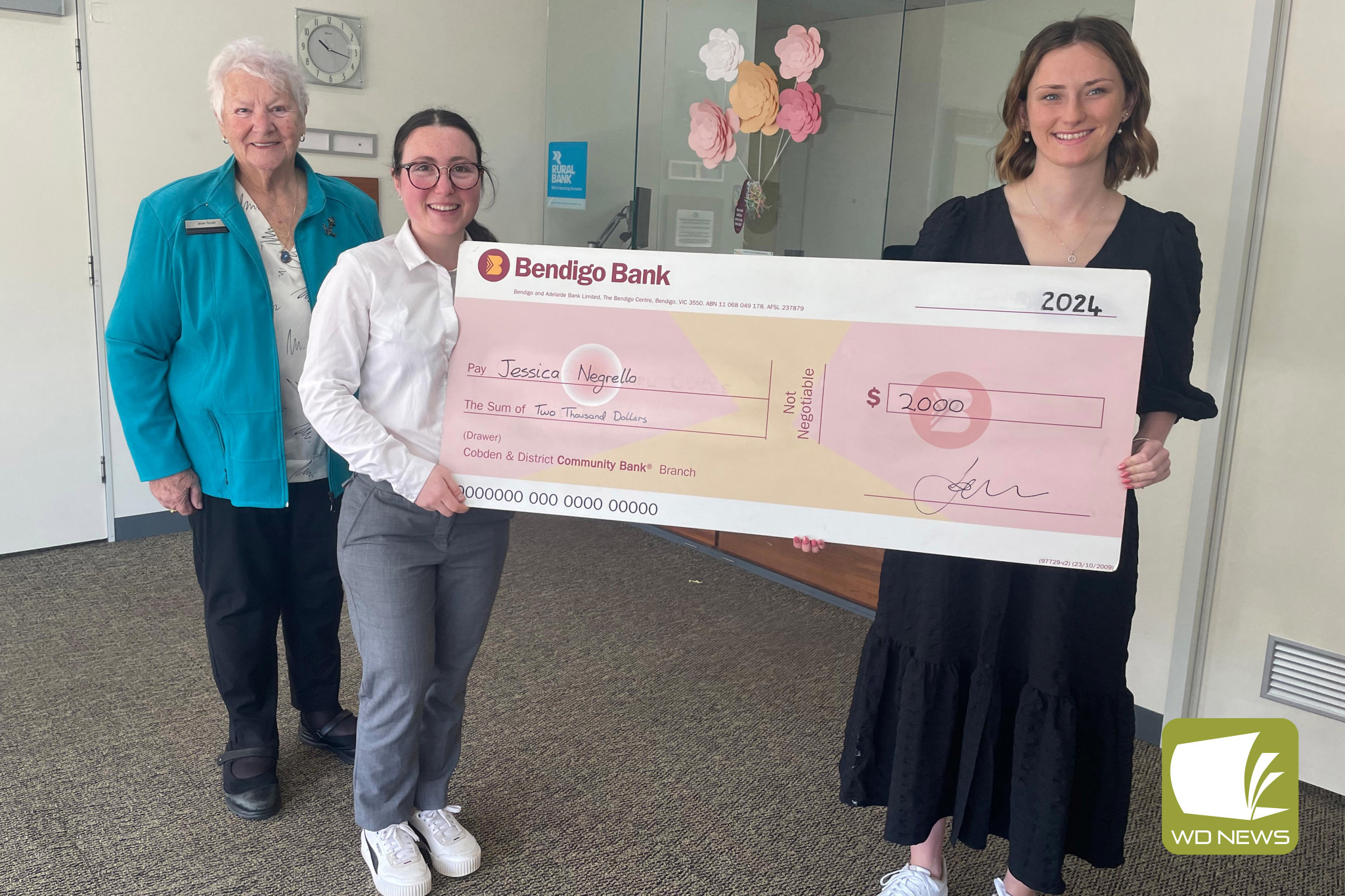 What a boost: Cobden and Camperdown Community Bank director Joan Scott, customer service officer Brooke McCormick and first year apprentice Jess Negrello who received a $2000 grant from the bank.