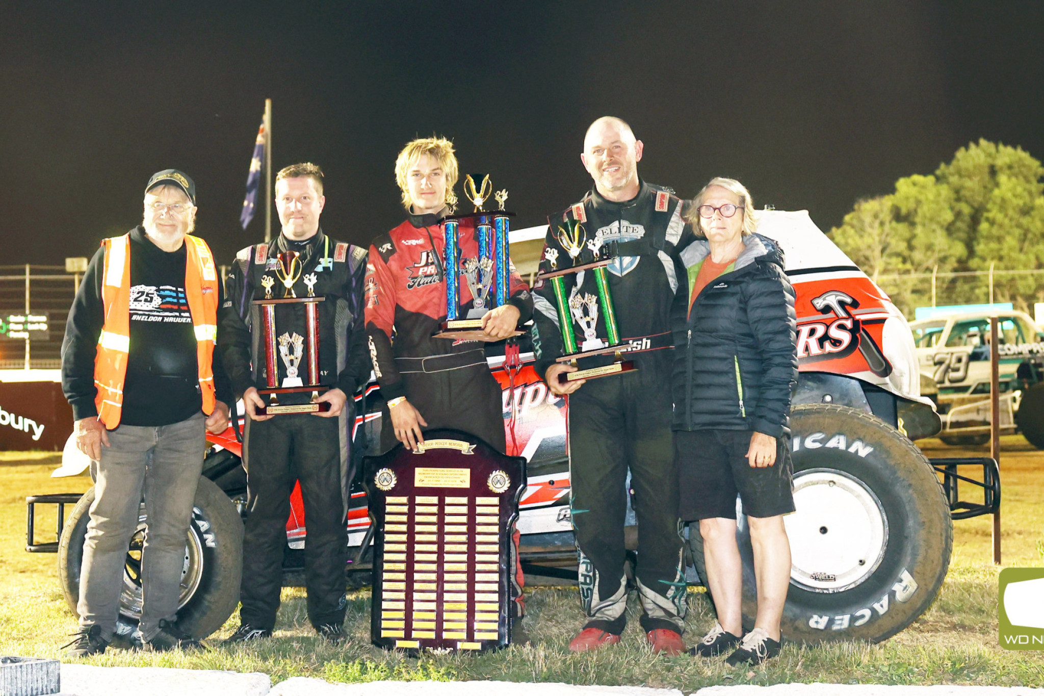 Neil Podger (left) and wife Lynda (right) with podium winners Jaimie May, Jacob Pitcher and Shaun Walsh.