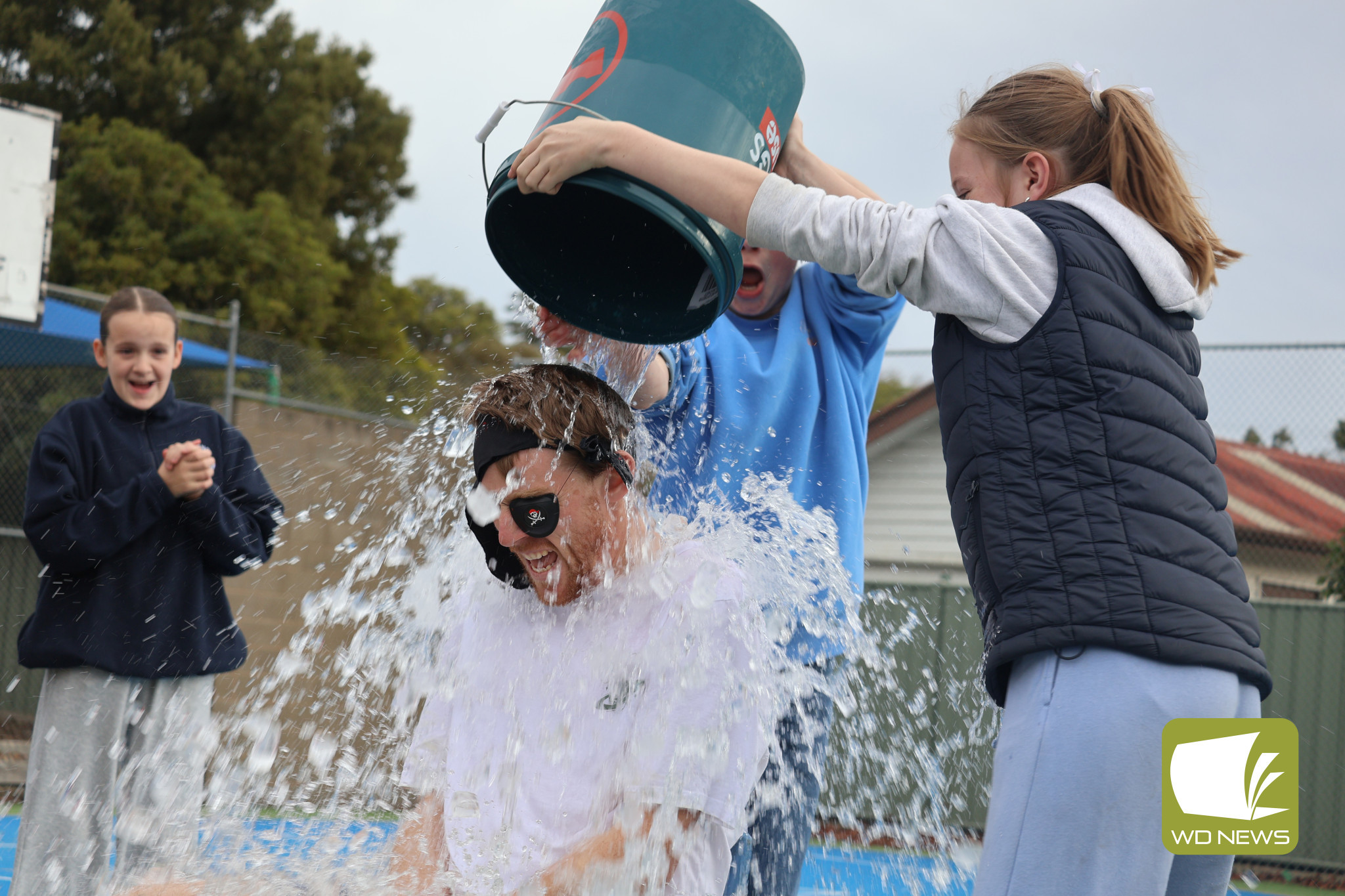 St Thomas’ Primary School teacher Patrick Sinnott was among the staff who students had voted to take part in last week’s ice bucket challenge to raise funds and awareness for FightMND.