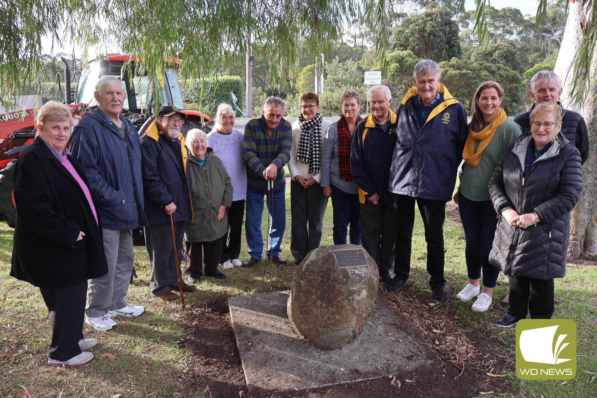 Historic: Members of the community gathered in Timboon last Thursday to return the town’s time capsule to its resting place outside the Timboon and District Hall.