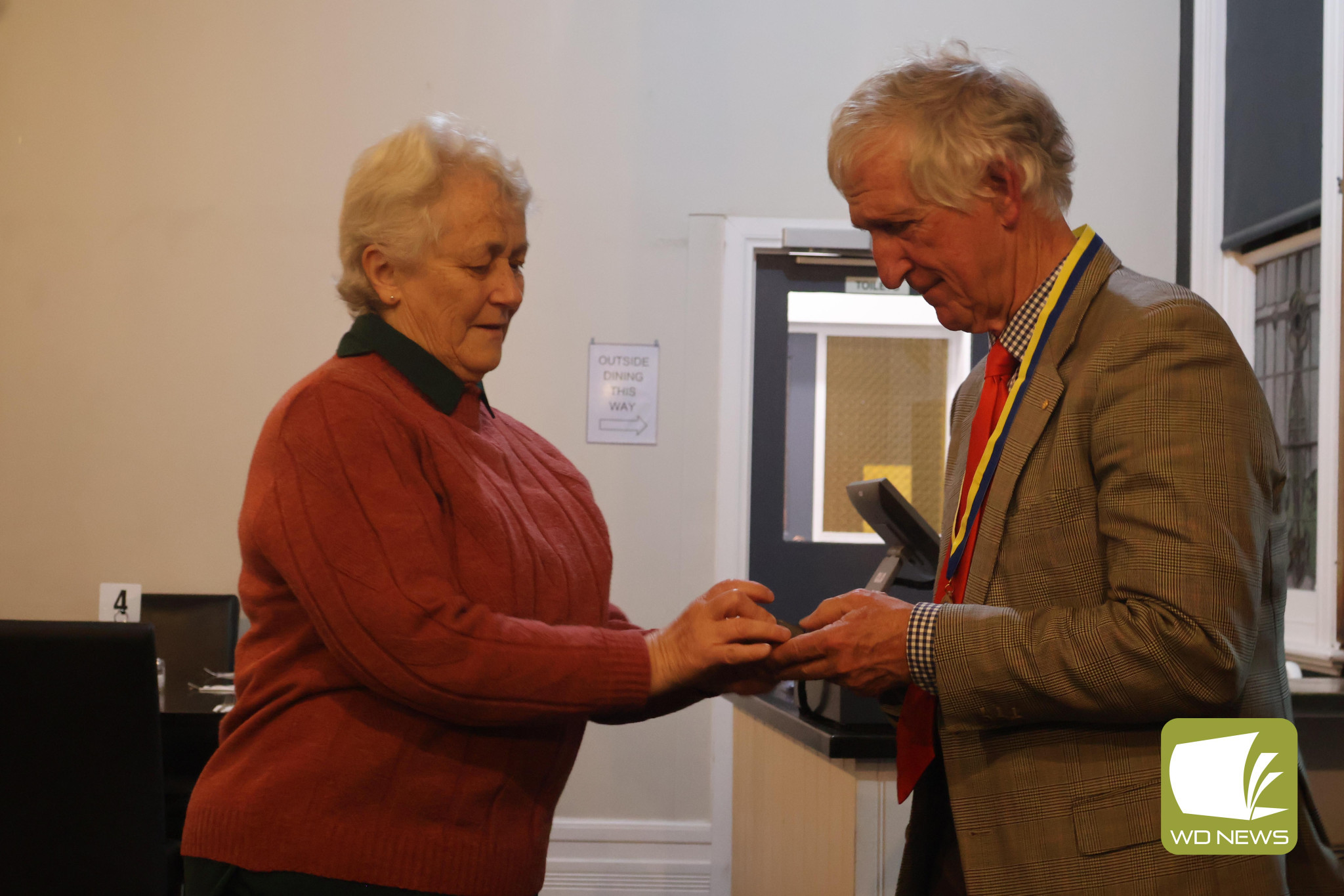 Paul Harris fellow: Camperdown Rotary Club president Jan MacDonald presented Dr John Menzies OAM with a Paul Harris Fellowship.