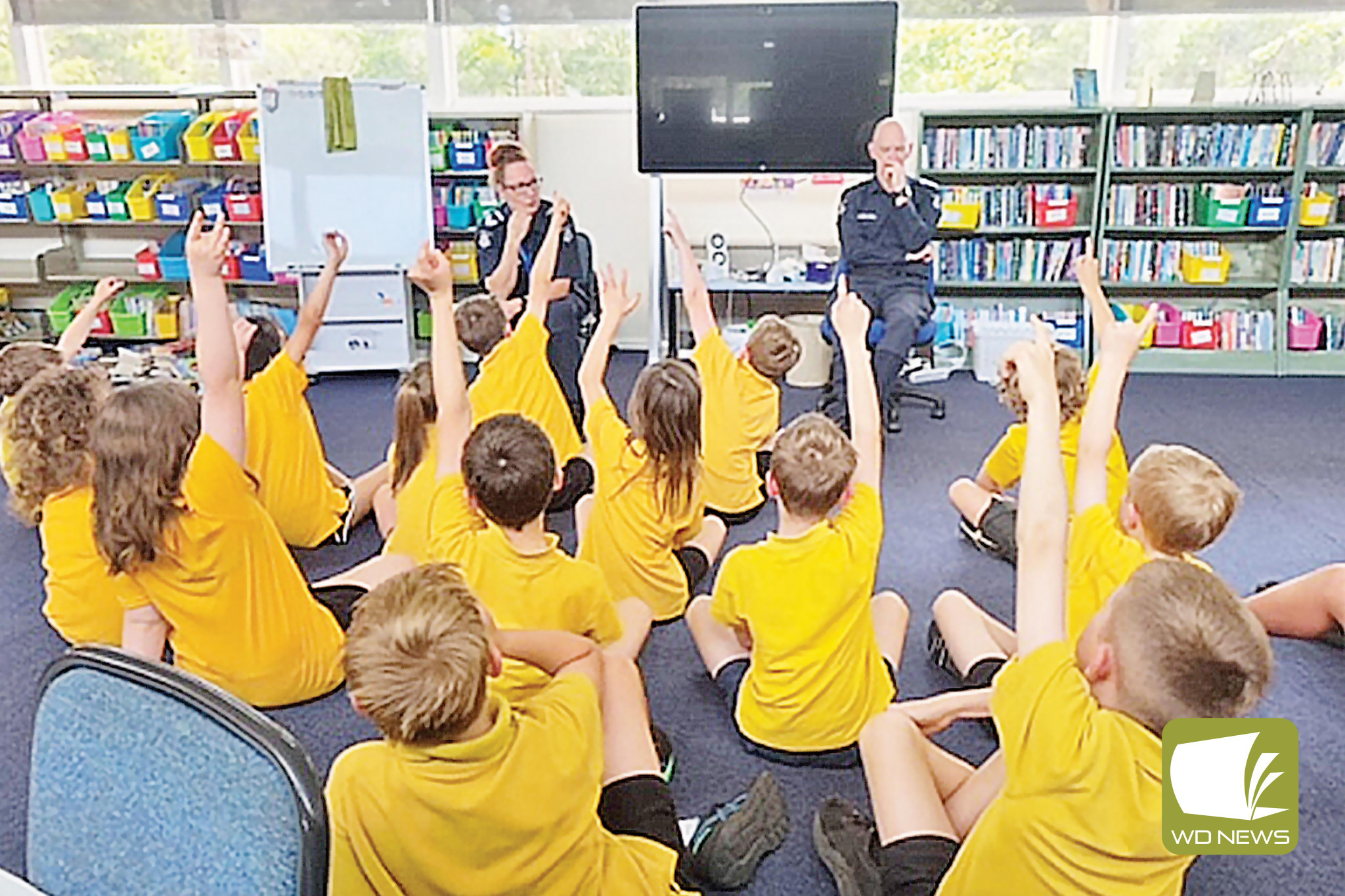 Important message: Senior Constable Brooke Pollock and Senior Constable John Keats from the Warrnambool Police station spoke to Simpson Primary School about cyberbullying.