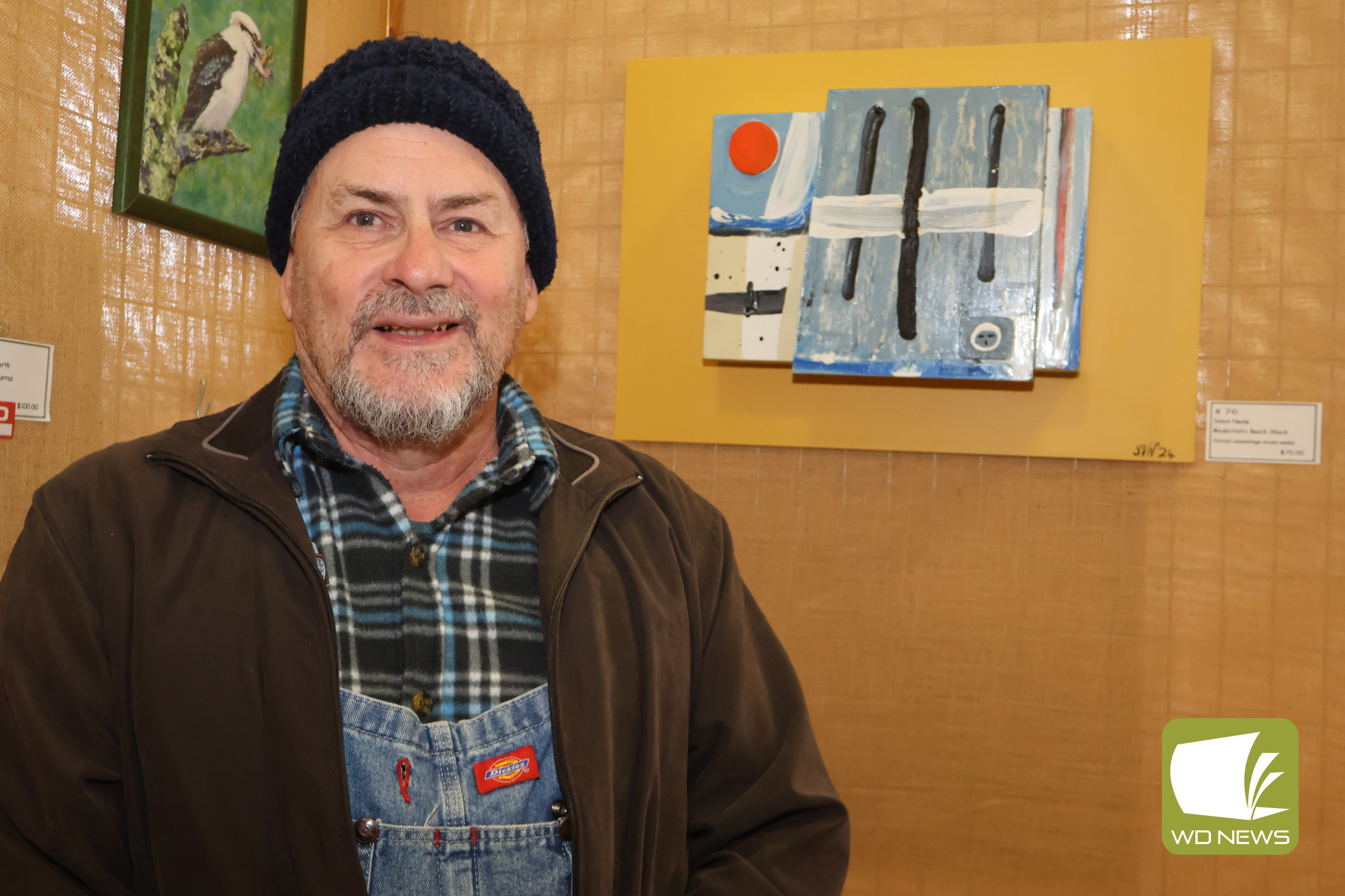 On display: The Mortlake Art Show 2025 was hailed a success despite a heavy downpour of rain chasing off some visitors. The show saw a record number of entries thanks to artists such as Simon Neale (pictured).
