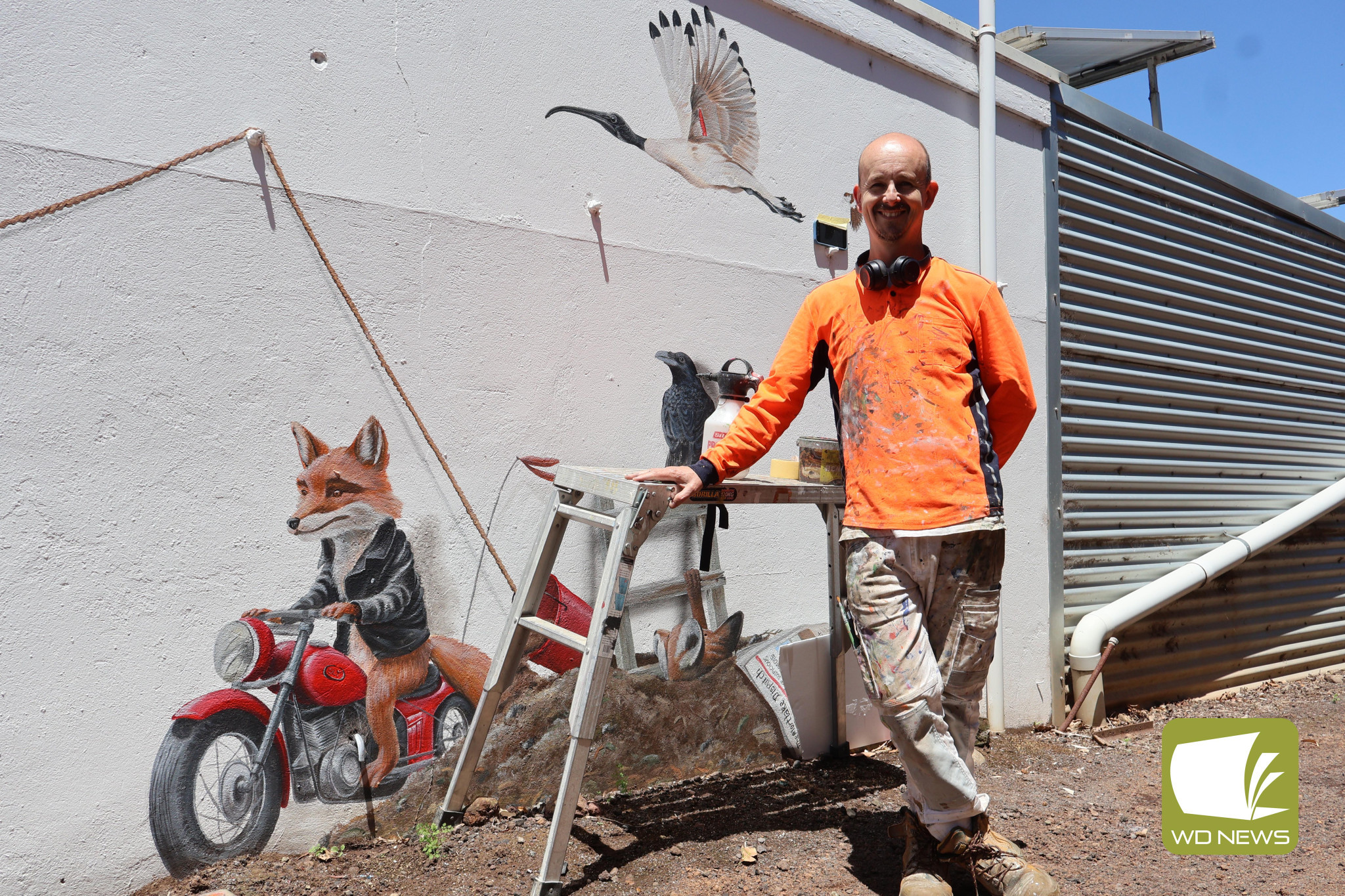 A story emerges: Warrnambool-based artist Jimmi Buscombe was back in town last week, adding some new characters to his unfolding mural at the Mortlake Roadhouse.