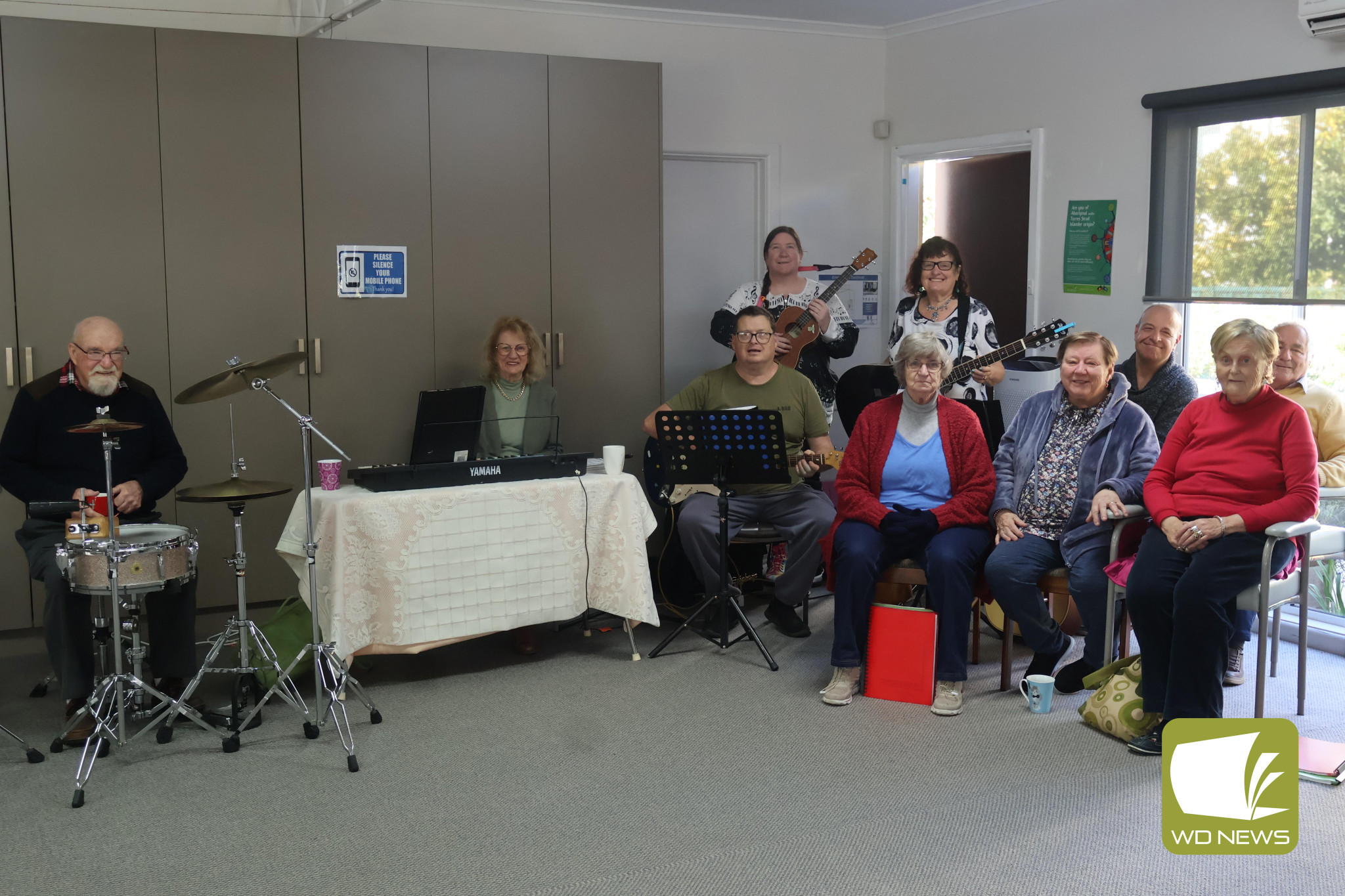 Songs and smiles: The Community House Music Group played a variety of upbeat songs at the David Newman Centre on Wednesday.
