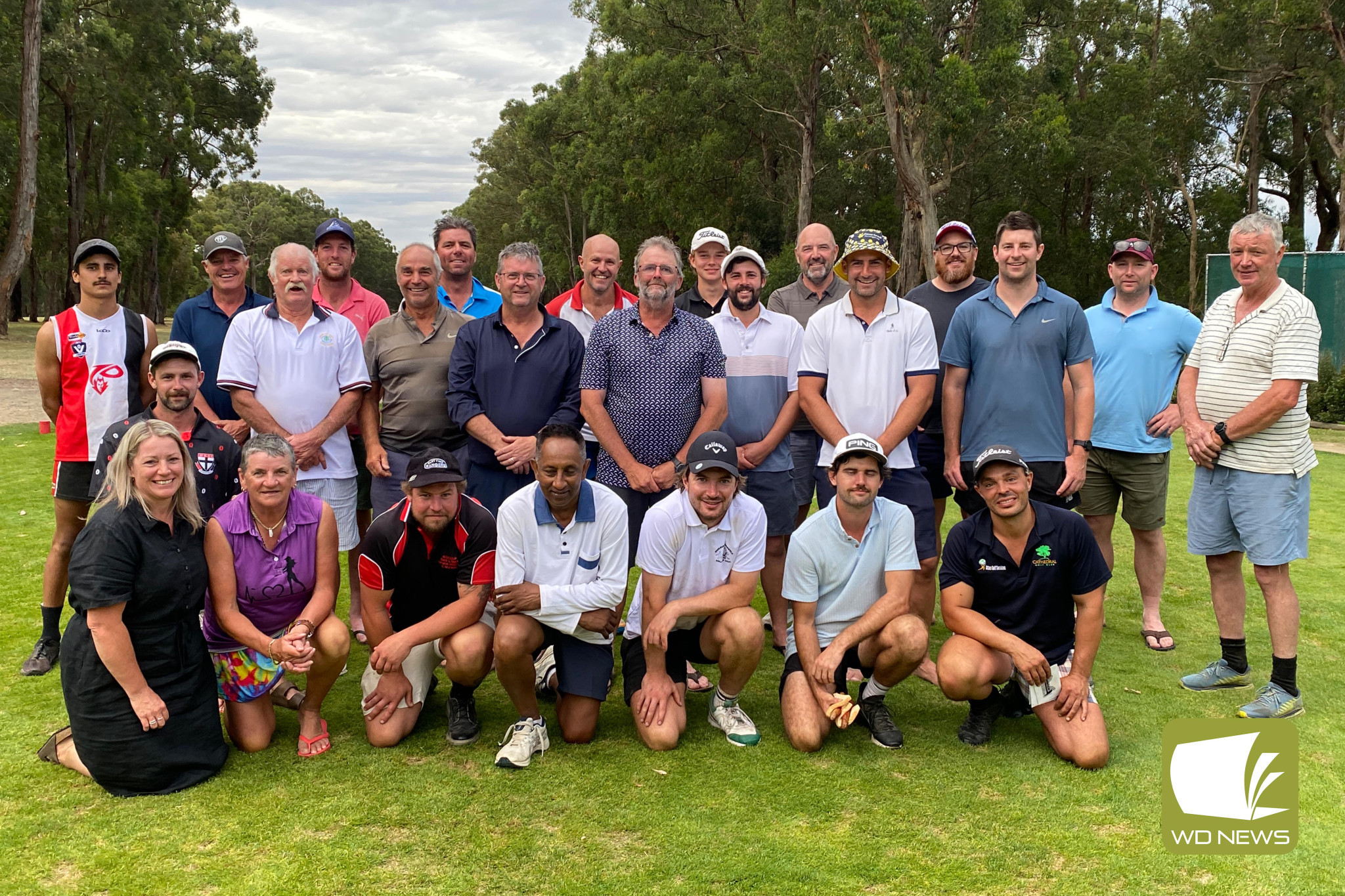 A great cause: A group of golfers braved sweltering heat to raise more than $7000 for Cancer Council as part of the Longest Day fundraiser in Timboon this month. Among the golfers was former AFL superstar Ben Cunnington, a Cobden product who knows all too well the fight those living with cancer endure.