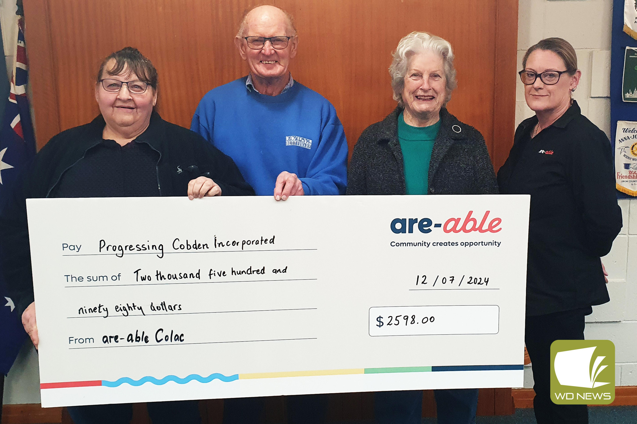Support appreciated: Cobden and District Historical Society members Delia Kerr, Colin Kerr and Judith Gribble accept a cheque from are-able’s Rebecca Huth.