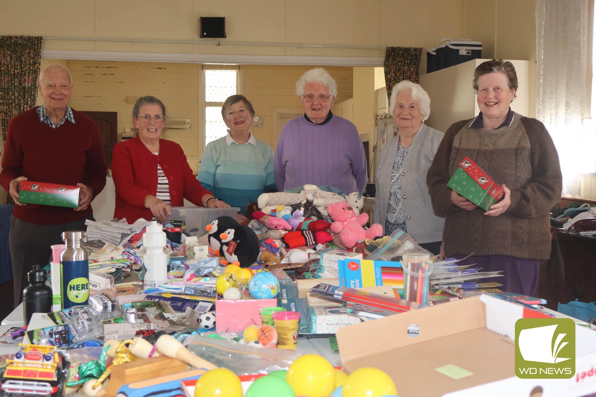 The spirit of giving: Volunteers packaged 114 boxes of goods over the weekend as part of local efforts to support Operation Christmas Child. The boxes will be shipped overseas to children in need this Christmas.