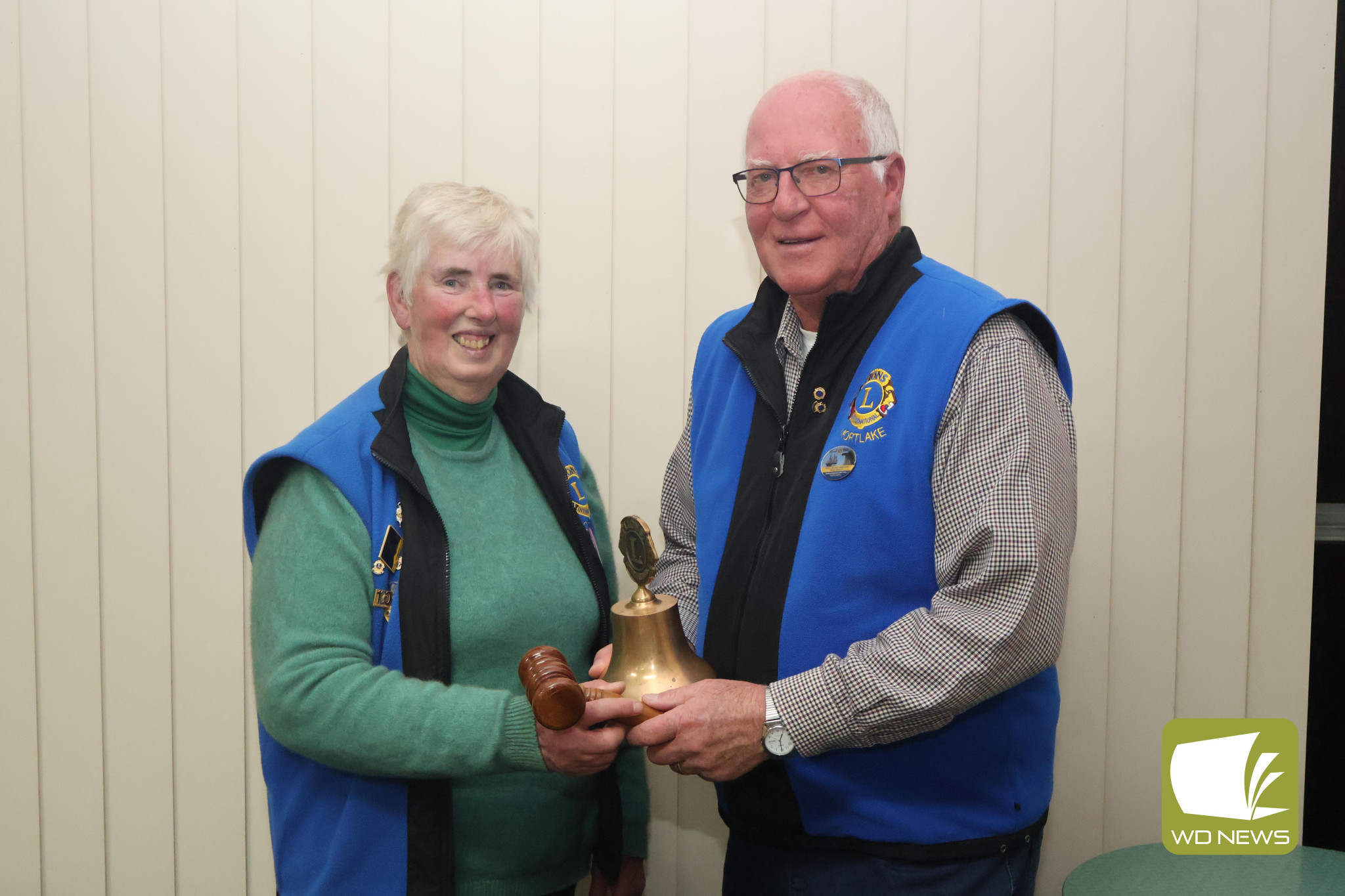 Congratulations: New Lions president Heather Rowe received the gavel from outgoing president Alan Wentworth after another successful year.