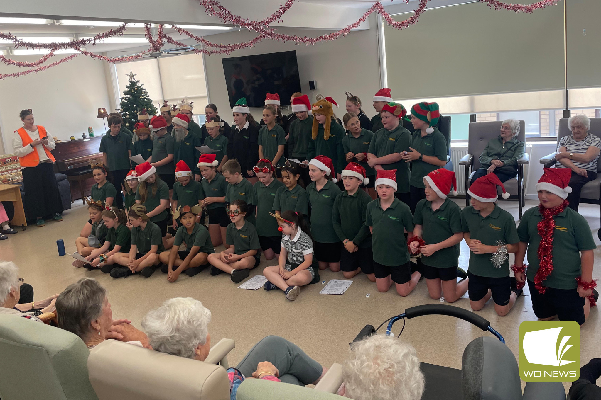 Merry Christmas: Cobden Primary School students sing Christmas carols for residents at Cobdenhealth.