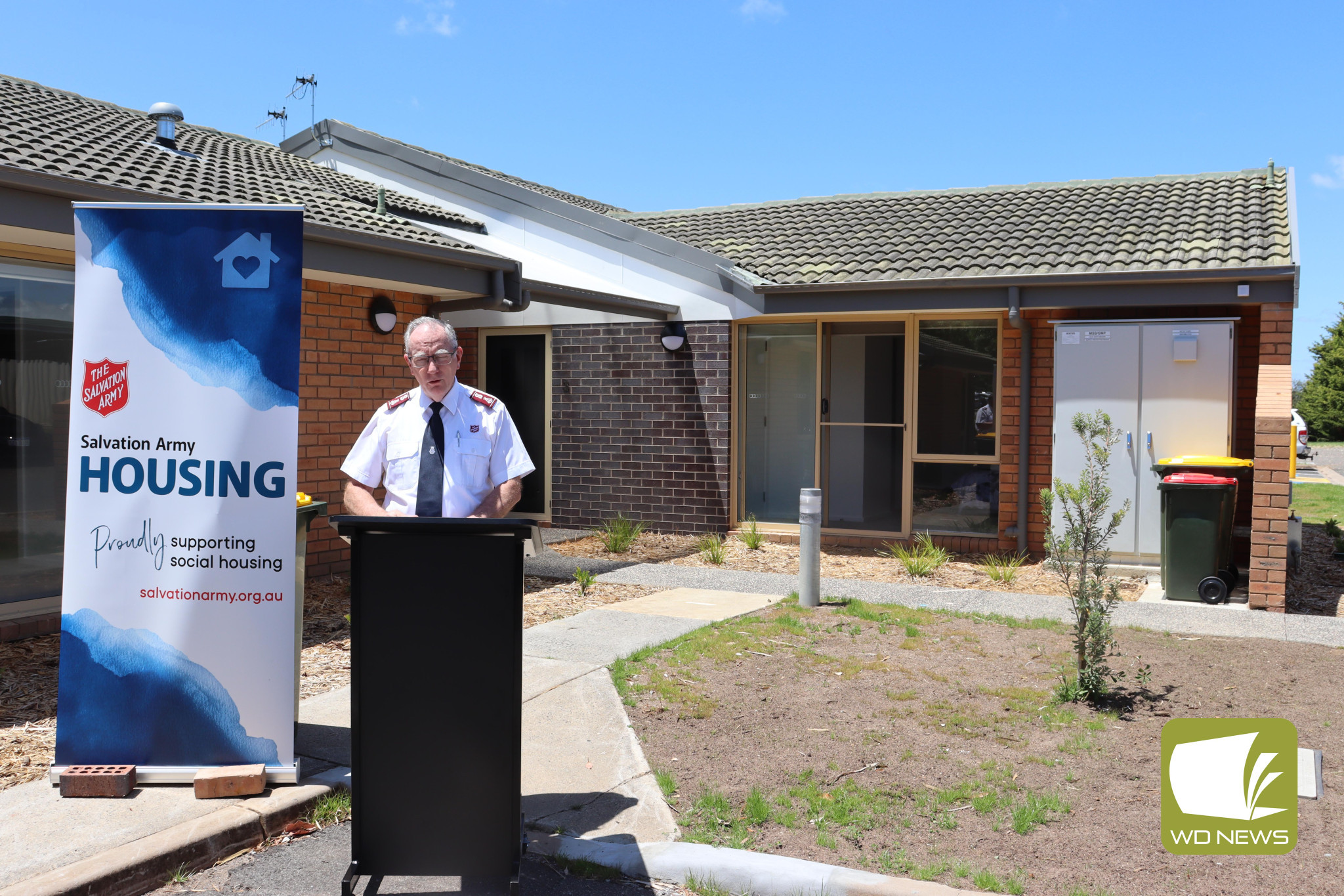 Welcome news: Salvation Army division leader state Victoria colonel Kelvin Merrett spoke at the official opening of the newly finished Tandarook House social housing redevelopment.