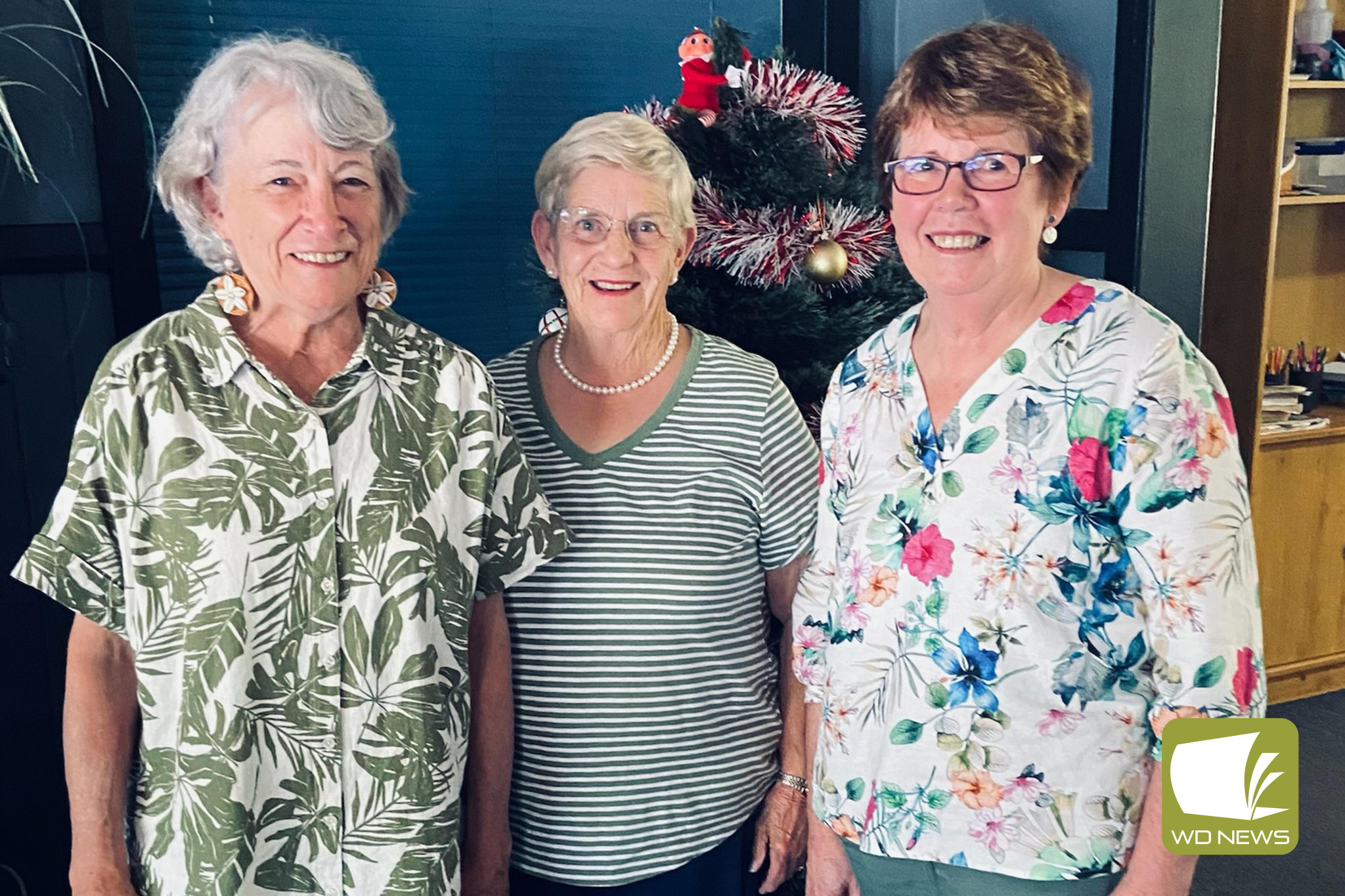 Congratulations: Timboon Opportunity Shop (TOPS) treasurer Louise Blair, co-ordinator Brenda Parfett and secretary Evelyn Thompson celebrate a busy 12 months.