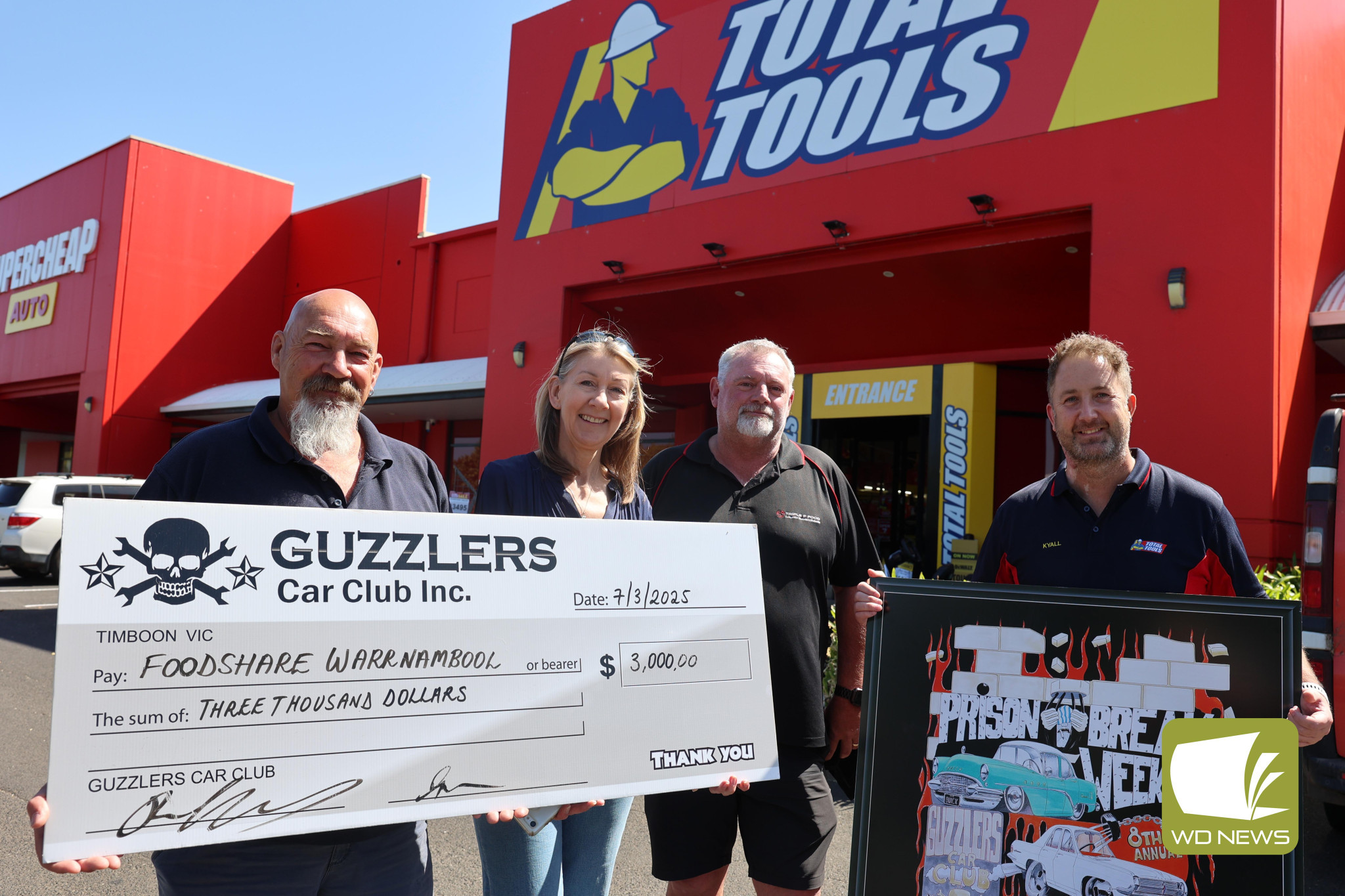 Donation: Guzzlers Car Club members Glenn Tracey and Claude Love with Food Share executive officer Amanda Hennessy and Kyall Wragge from Total Tools (sponsors of the Prison Break weekend).