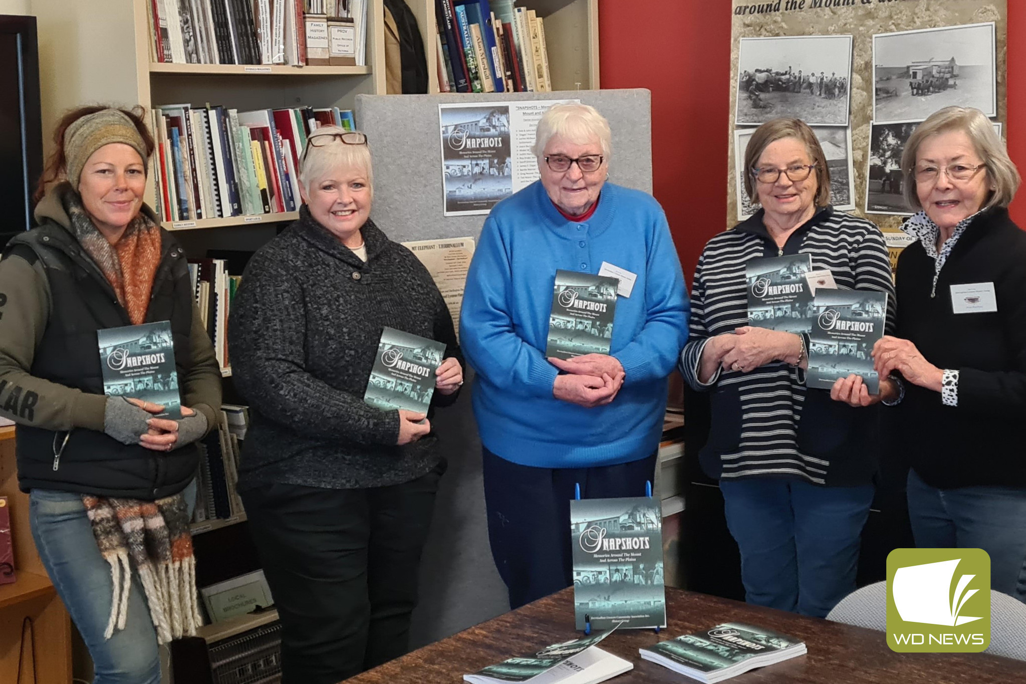 Collected history: Derrinallum Lismore History Group members and friends Carrie Miller, Louise Molesworth, Deb Holliday, Leonie McKenzie and Avon Buchholz recently launched “Snapshots: Memories Around the Mount and Across the Plains”.