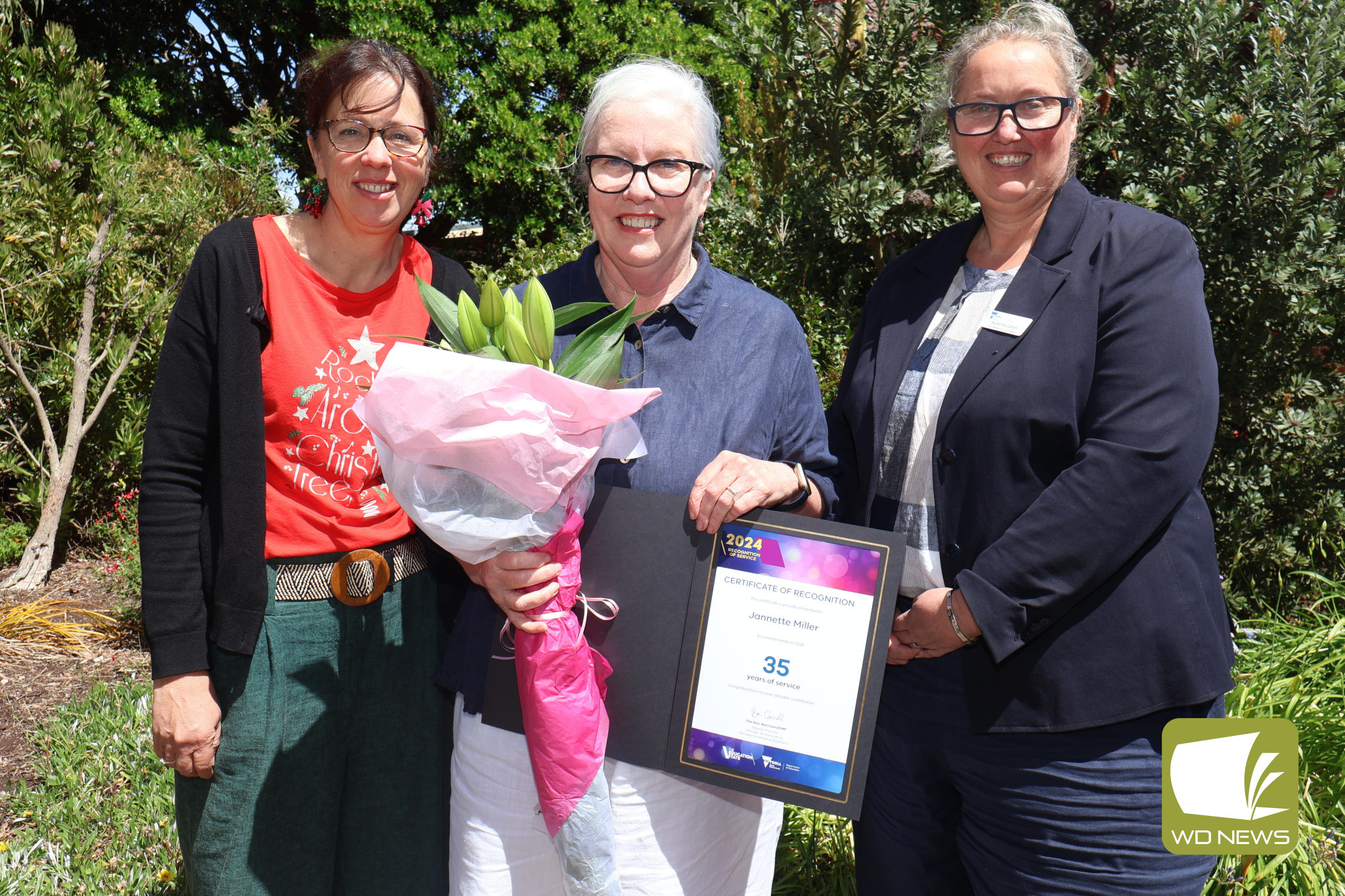 Congratulations: Terang College art teacher Jannette Miller (middle) was recognised for her 35 years of dedication to supporting students during a ceremony last Wednesday. She is pictured with Terang College principal Kath Tanner and Department of education area executive director south western Victoria region Suzanne Camm, who presented Mrs Miller with a certificate of recognition.