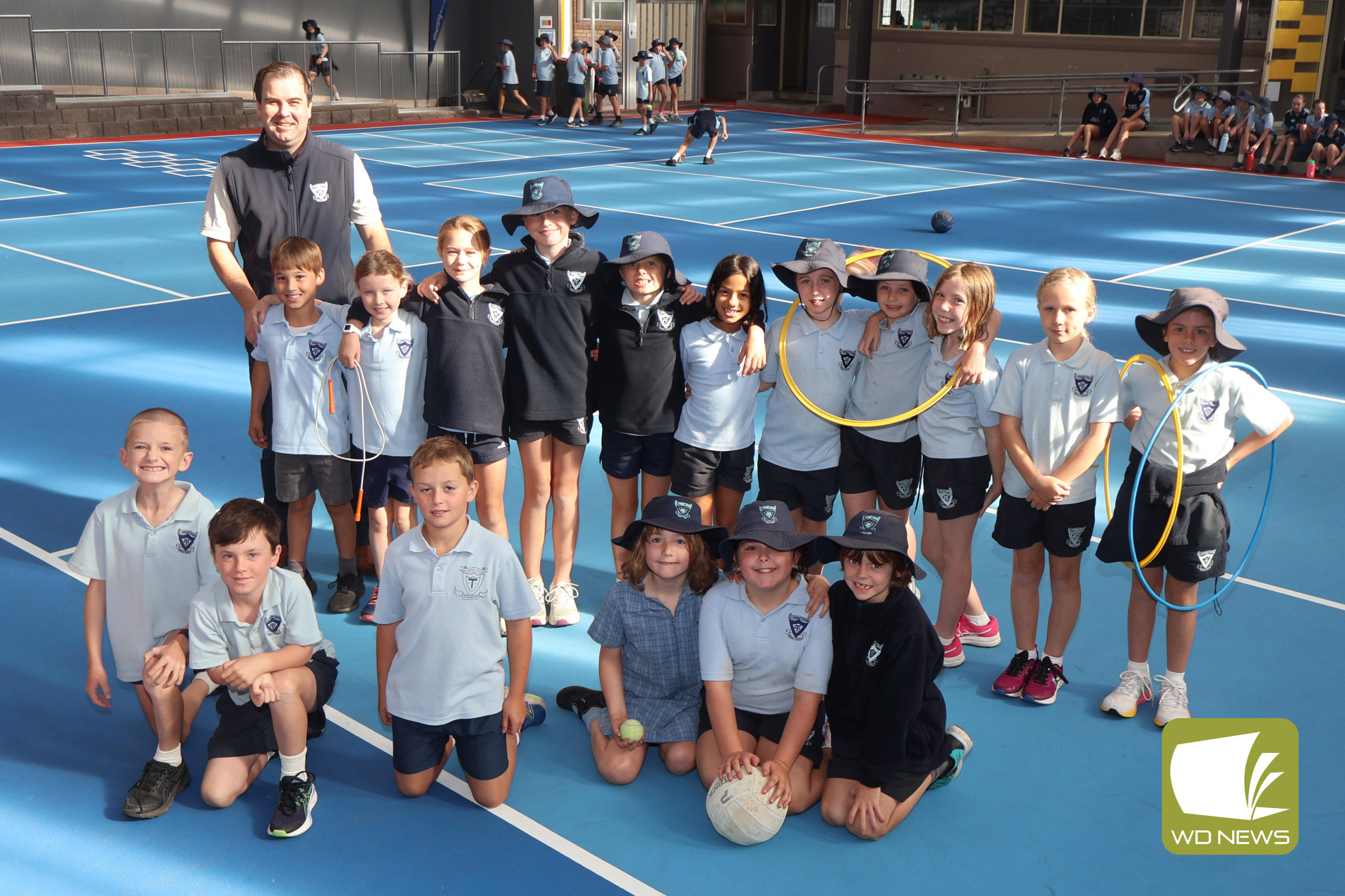 All smiles: St Thomas’ Primary School students have welcomed the completion of construction on a new undercover area after the school’s Parents and Friends Association raised over $31,000 during last year’s major fundraiser.