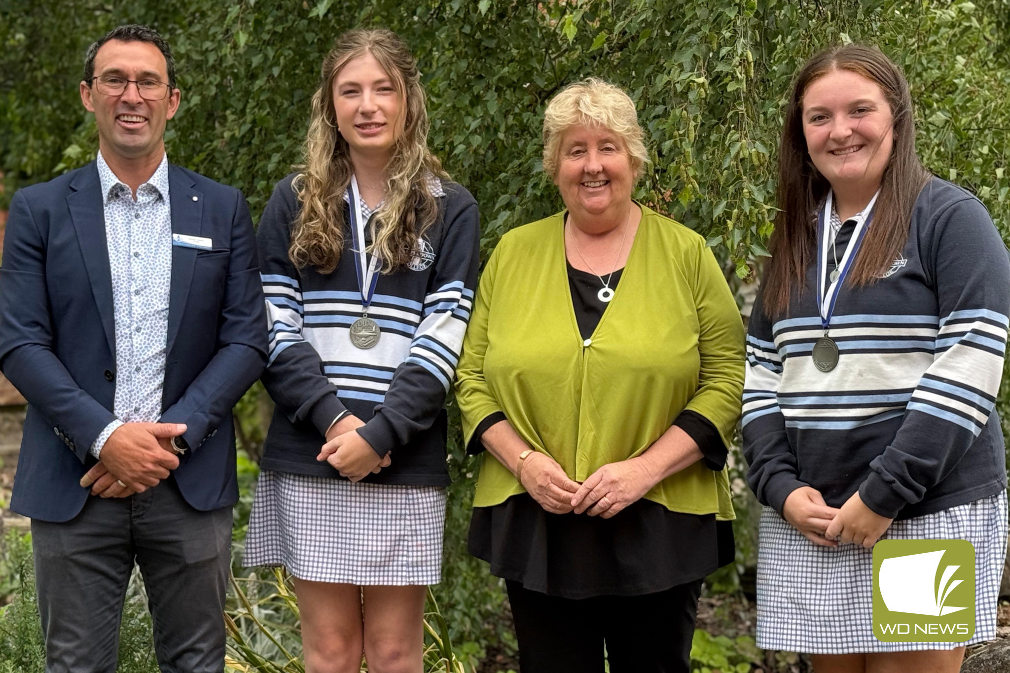 Camperdown College’s Duxes for 2024 are Elyse Cross (VCE) and Riley Stephenson (VM) (pictured with principal Xavier Davis and senior campus principal Vicki Angus).