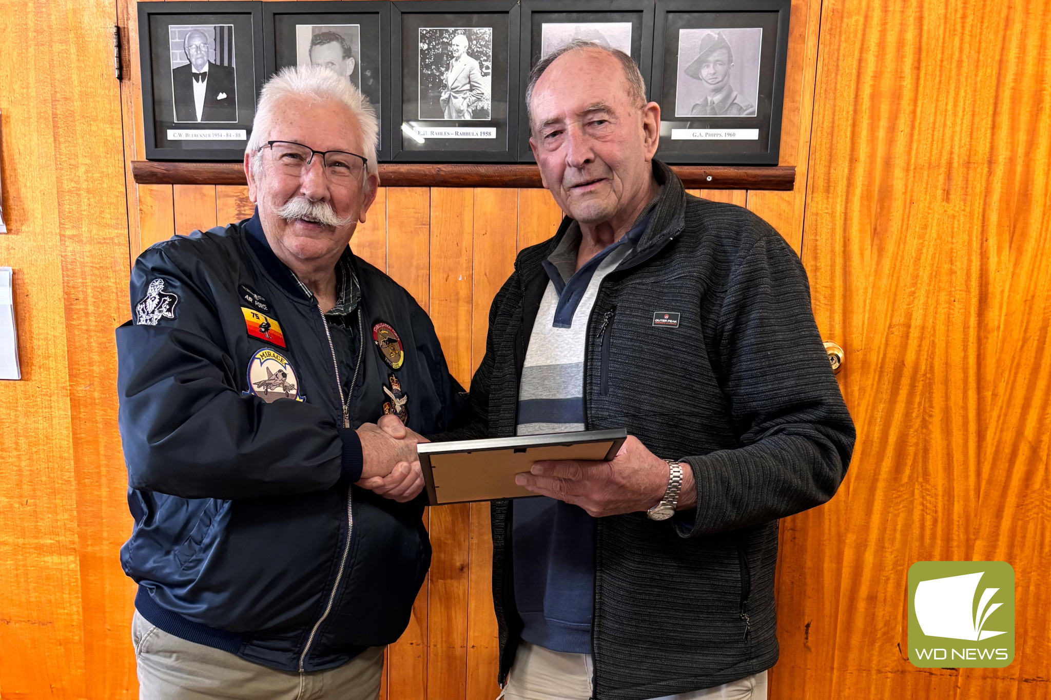 Service recognised: Camperdown RSL sub-branch president Kevin Murray presented Ron Greagen with a meritorious membership award recently.