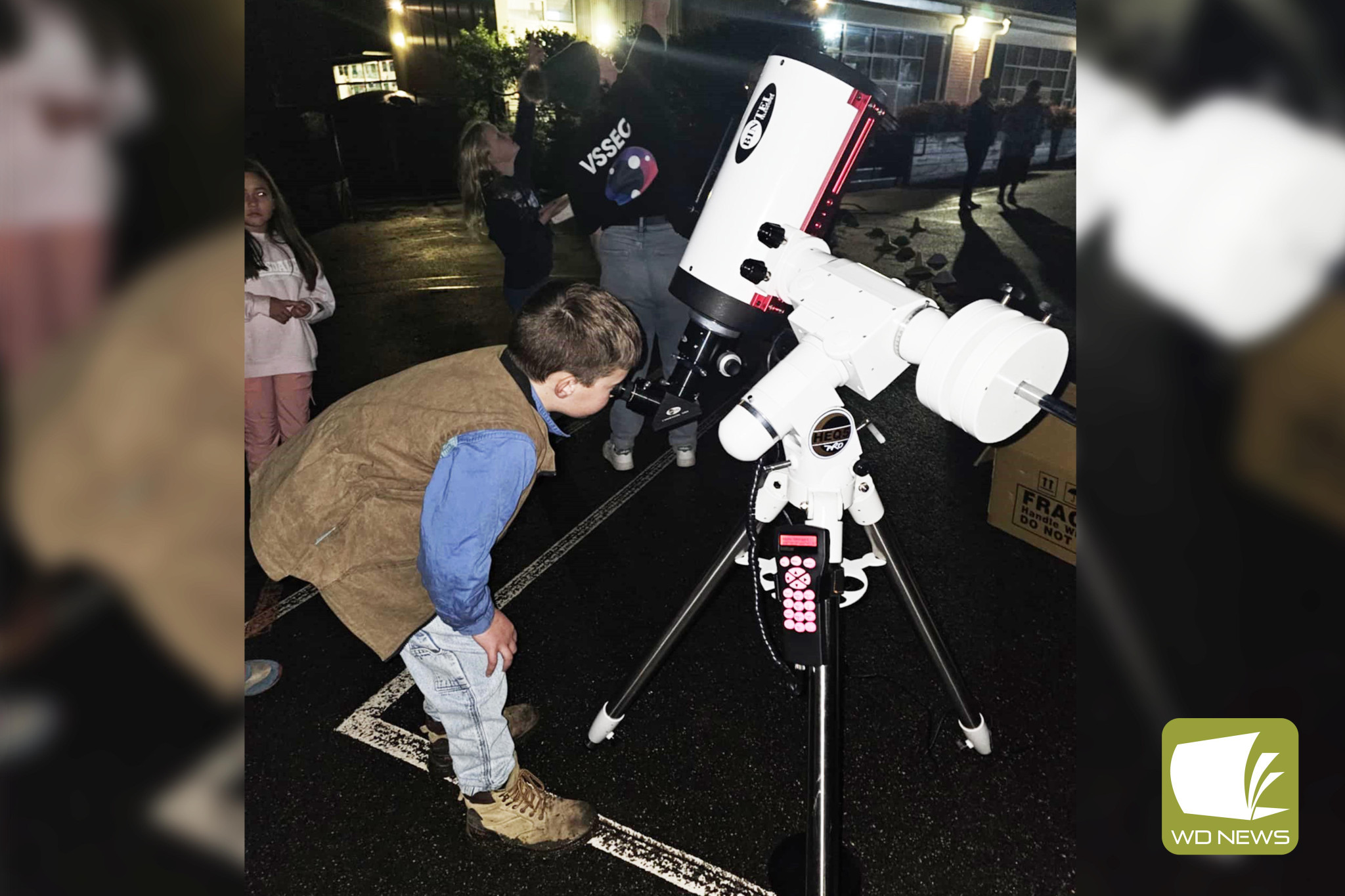 Heads in the stars: Camperdown College students and their families had the chance to stargaze as part of Science Week celebrations last week.