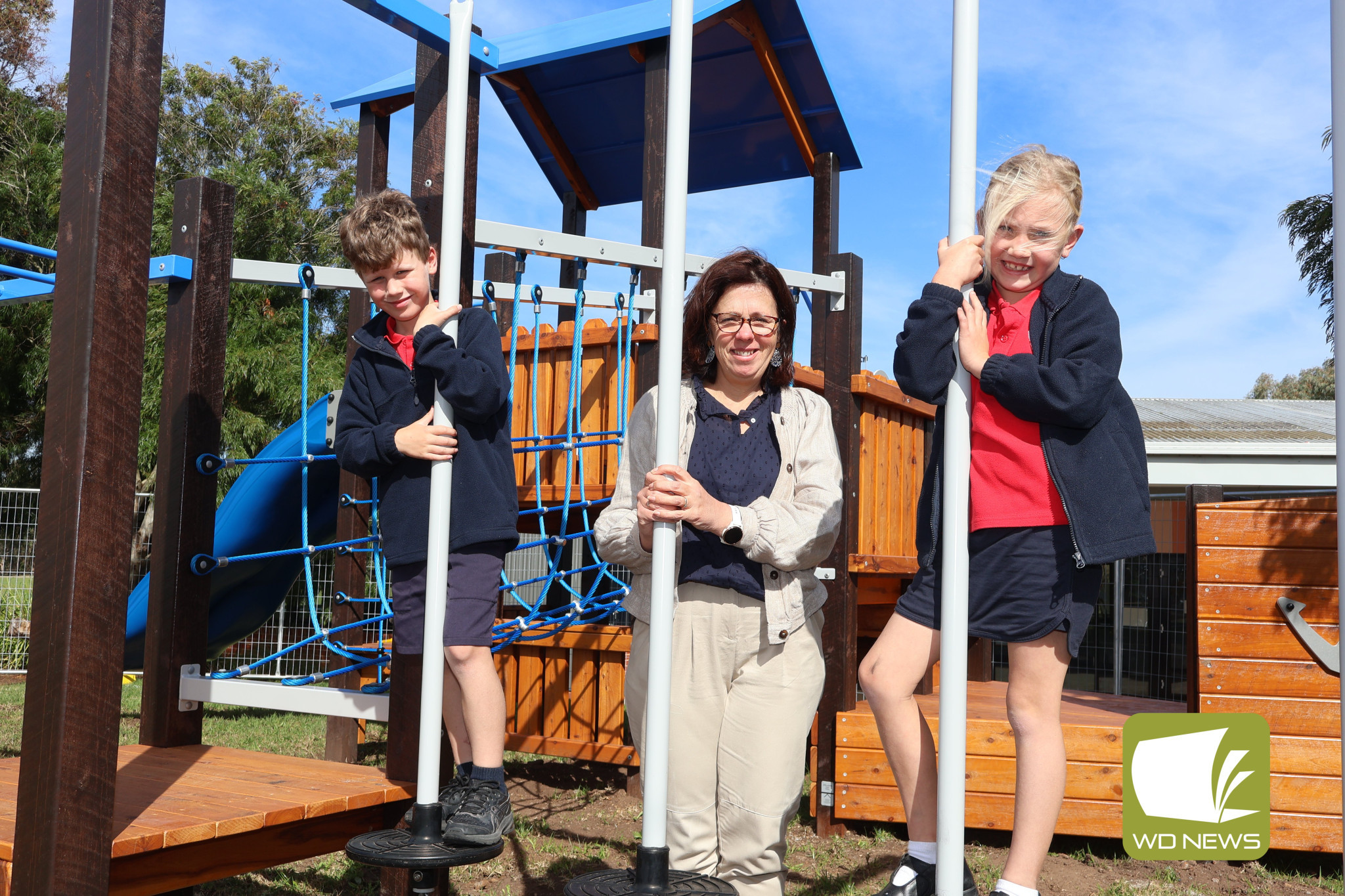 Generosity: Terang College students William Teal and Chelsea Cole, pictured with principal Kath Tanner, are excited to make use of the school’s new playgrounds.