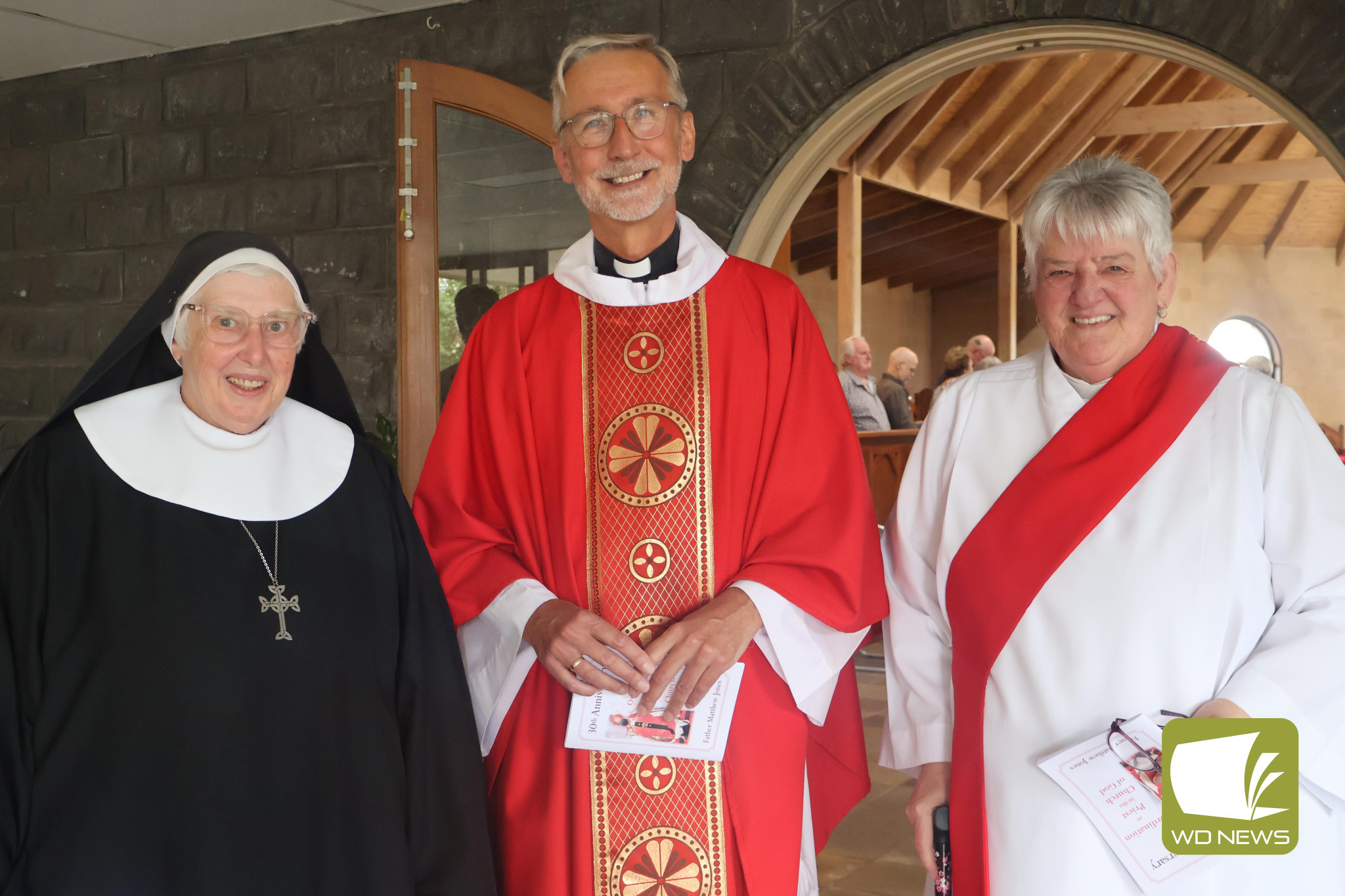 Special milestone: Superior of the Benedictine Abbey Sister Raphael Stone, Father Matthew Jones and Deacon Kaye Hanks helped mark Rev Jones’ 30th anniversary of priesthood.