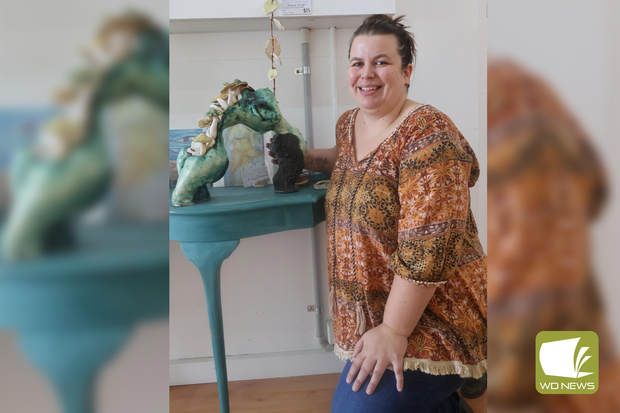 Crazy about ceramics: Ceramics artist Yonie Tiljak (pictured with her sculpture “Bending over backwards”) is inviting residents to learn more about her favoured medium.