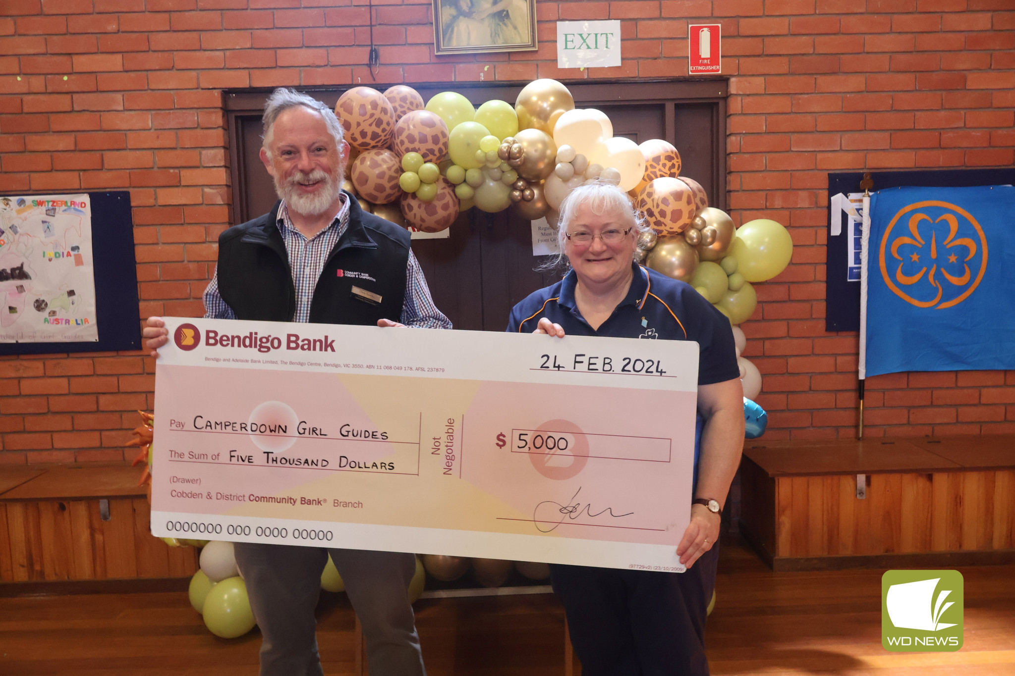 Girl Guides leader Glenda McIlveen pictured with Community Bank Cobden and Camperdown board member Chris Rodda was thrilled to receive $5000 to go towards bettering the Guide Hall.