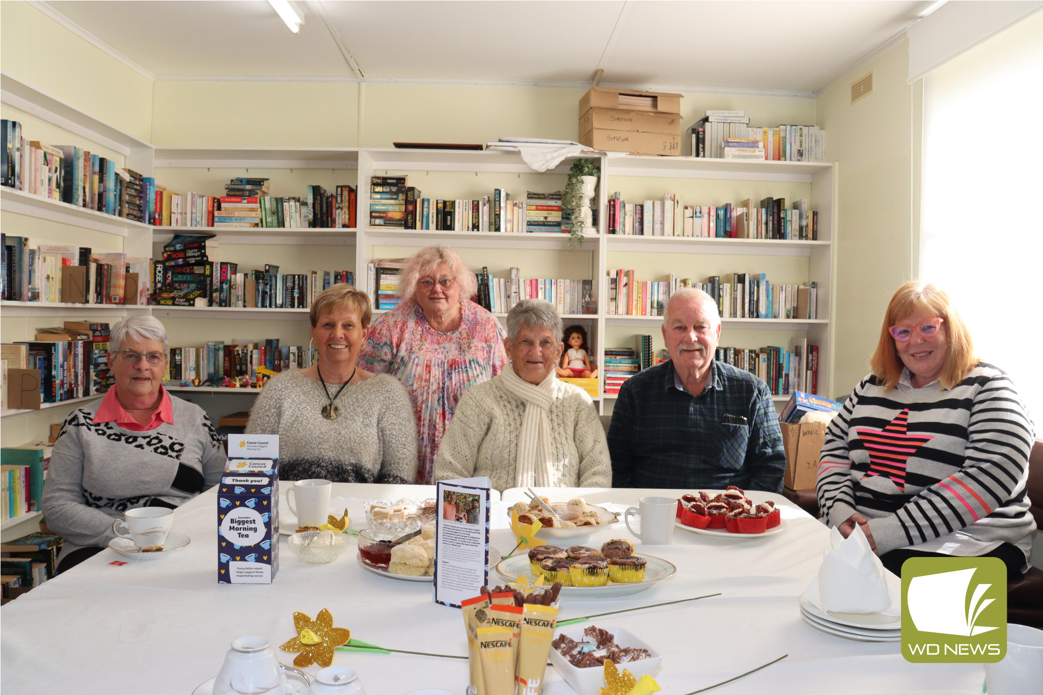 Morning chat: Bev Hawkes (from left), Corrie Dixon, Debra Smith, Denise Frith, Alf Frith and Sue Stevens enjoyed a warm cuppa and plenty of cakes thanks to Mrs Smith last Thursday morning.