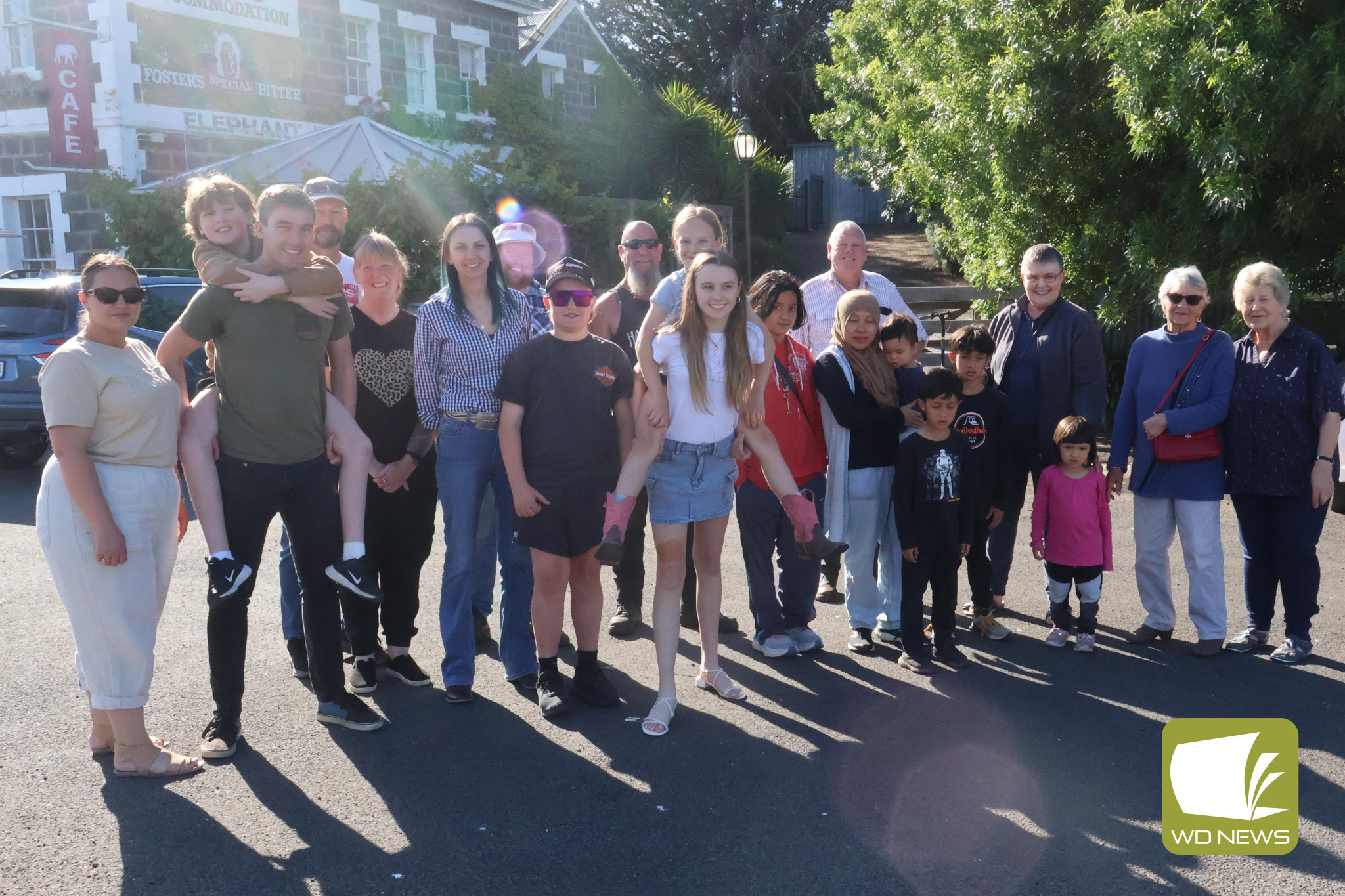 Safety boost: Letter writers, petition signatories and local community members celebrate outside Darlington's Elephant Bridge Hotel after the Victorian Government lowered the speed limit through Darlington after strong advocacy from the community.